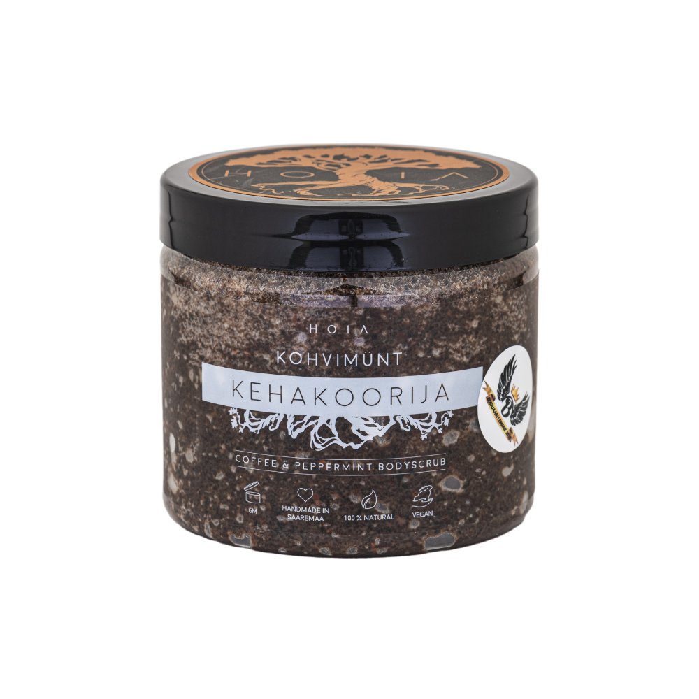 2. HOIA homespa coffee and peppermint body scrub jar in studio setting