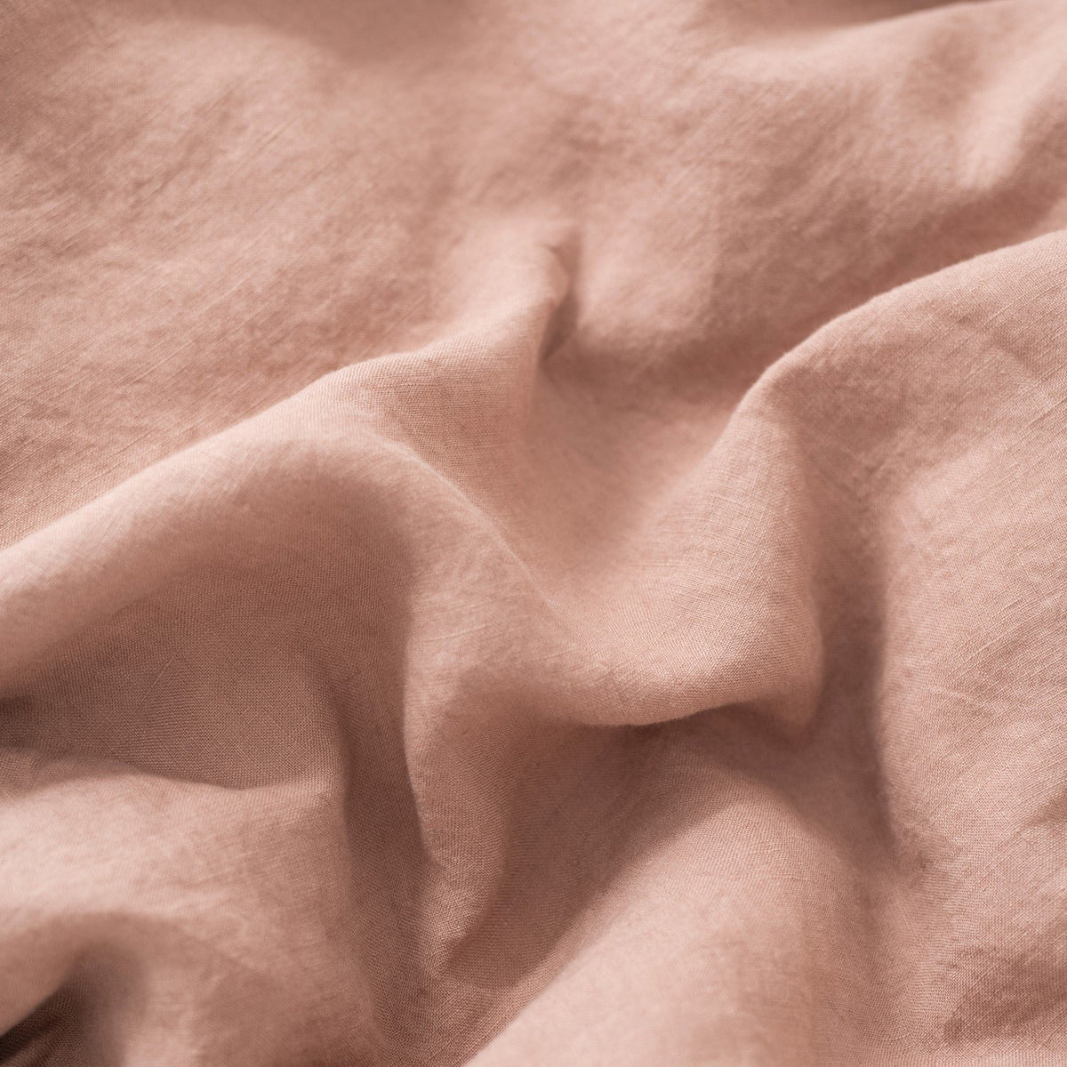 3. Close-up of cafe creme linen fabric showing soft texture and natural folds