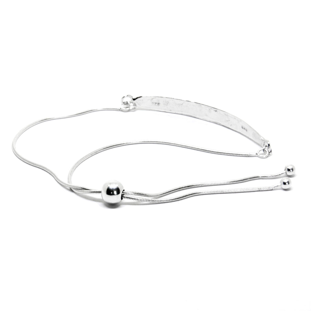4. Back view of silver SPRING Leaf bracelet by Agnes Veski Jewellery, highlighting adjustable chain and leaf pattern in studio