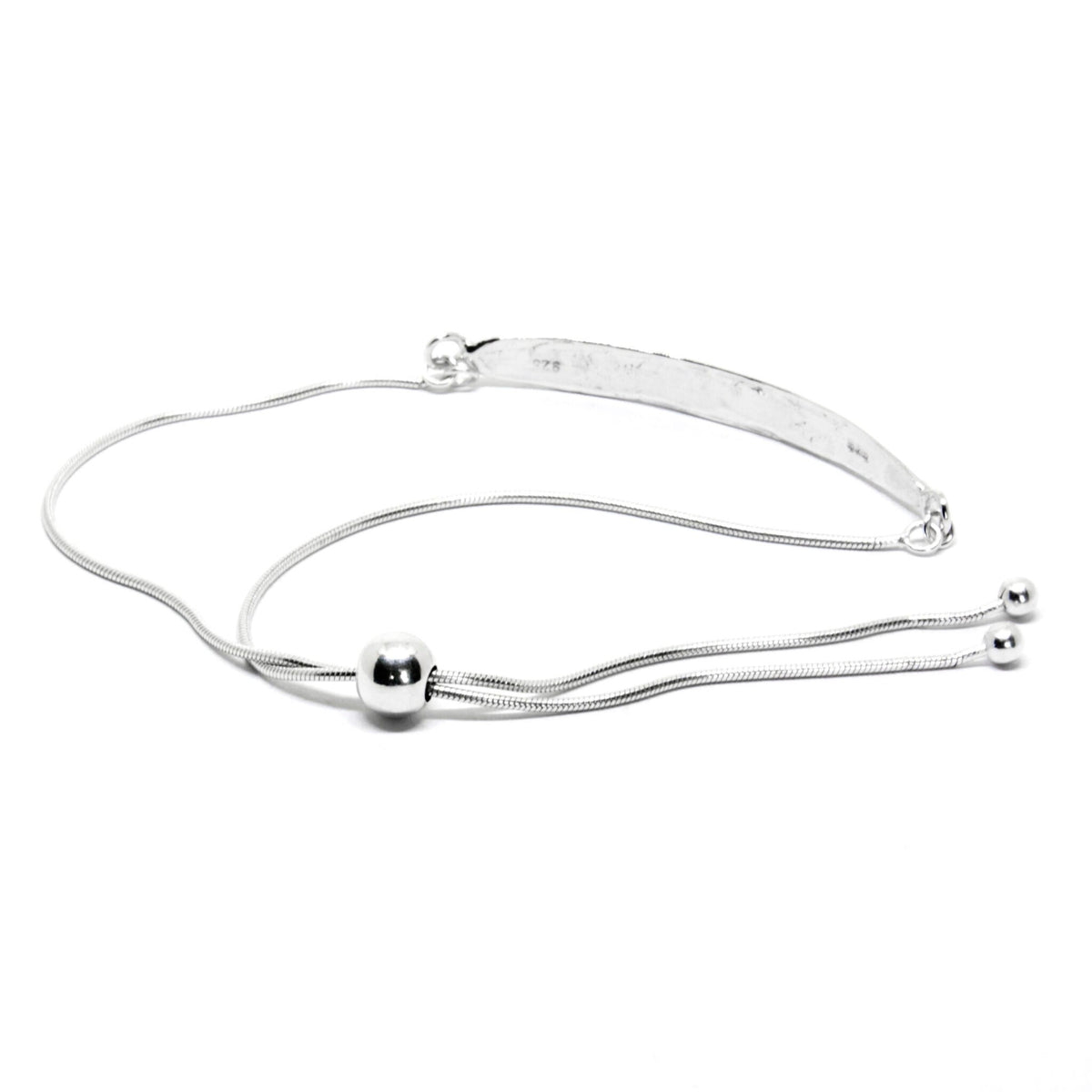 4. Back view of silver SPRING Leaf bracelet by Agnes Veski Jewellery, highlighting adjustable chain and leaf pattern in studio