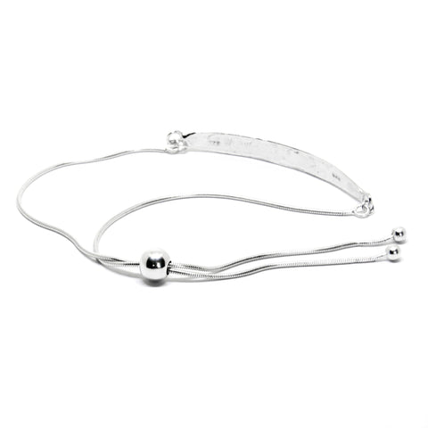4. Back view of silver SPRING Leaf bracelet by Agnes Veski Jewellery, highlighting adjustable chain and leaf pattern in studio