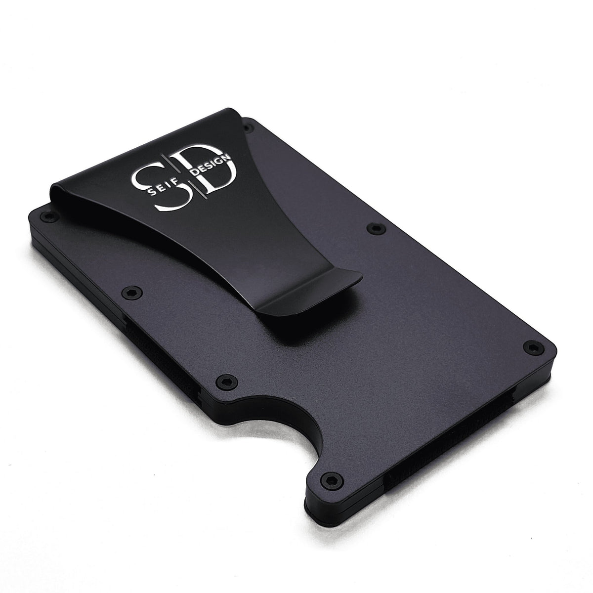 2. Angled view of black Seif Design cardholder with logo, highlighting sleek aluminum design and minimalist style on a white background