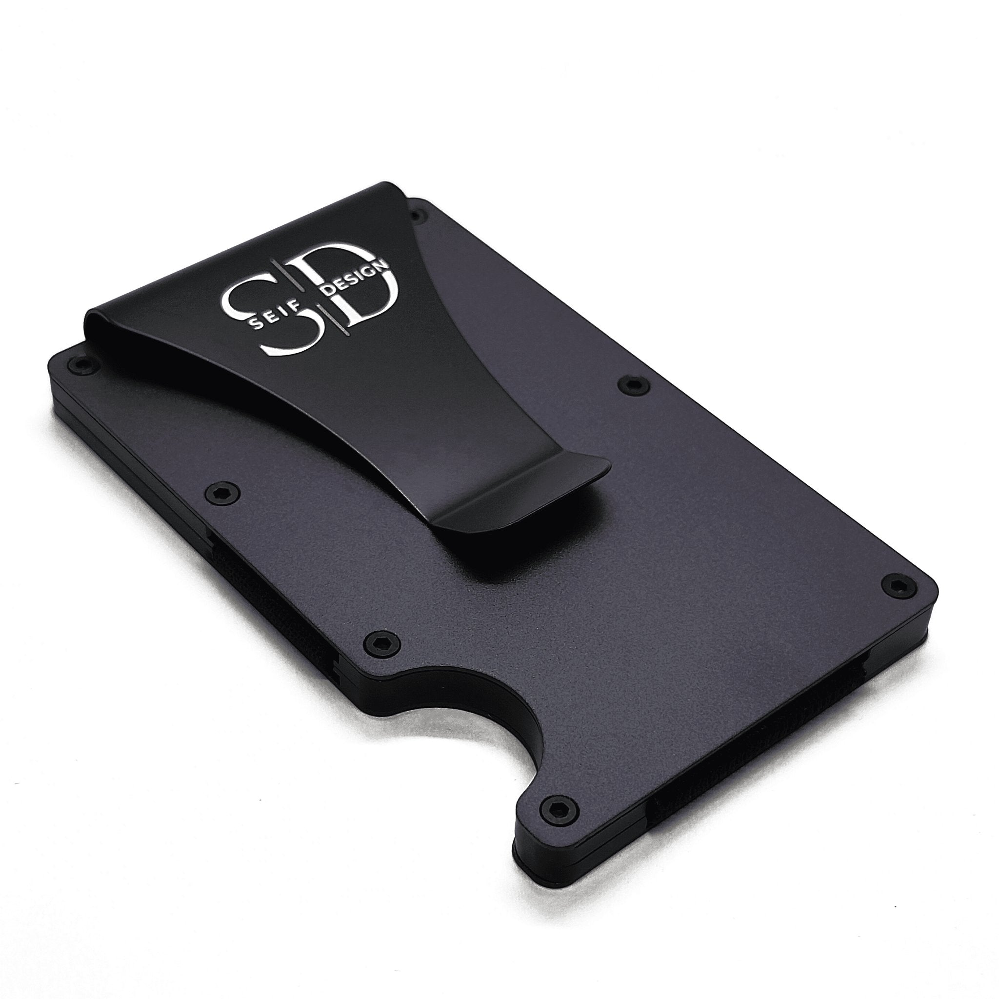 2. Angled view of black Seif Design cardholder with logo, highlighting sleek aluminum design and minimalist style on a white background