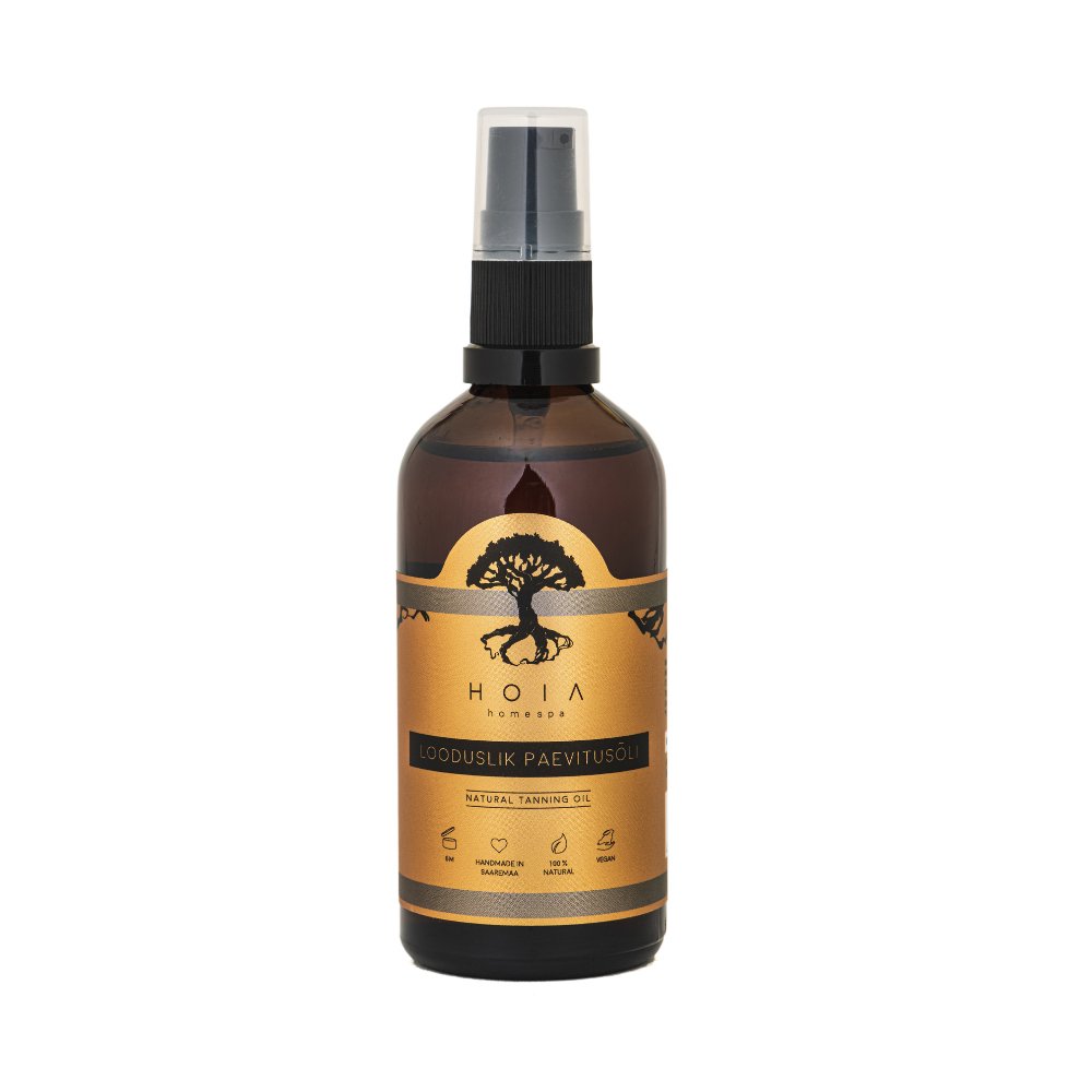 2. Studio shot of HOIA homespa Natural Tanning Oil bottle with gold label, showcasing eco-friendly packaging