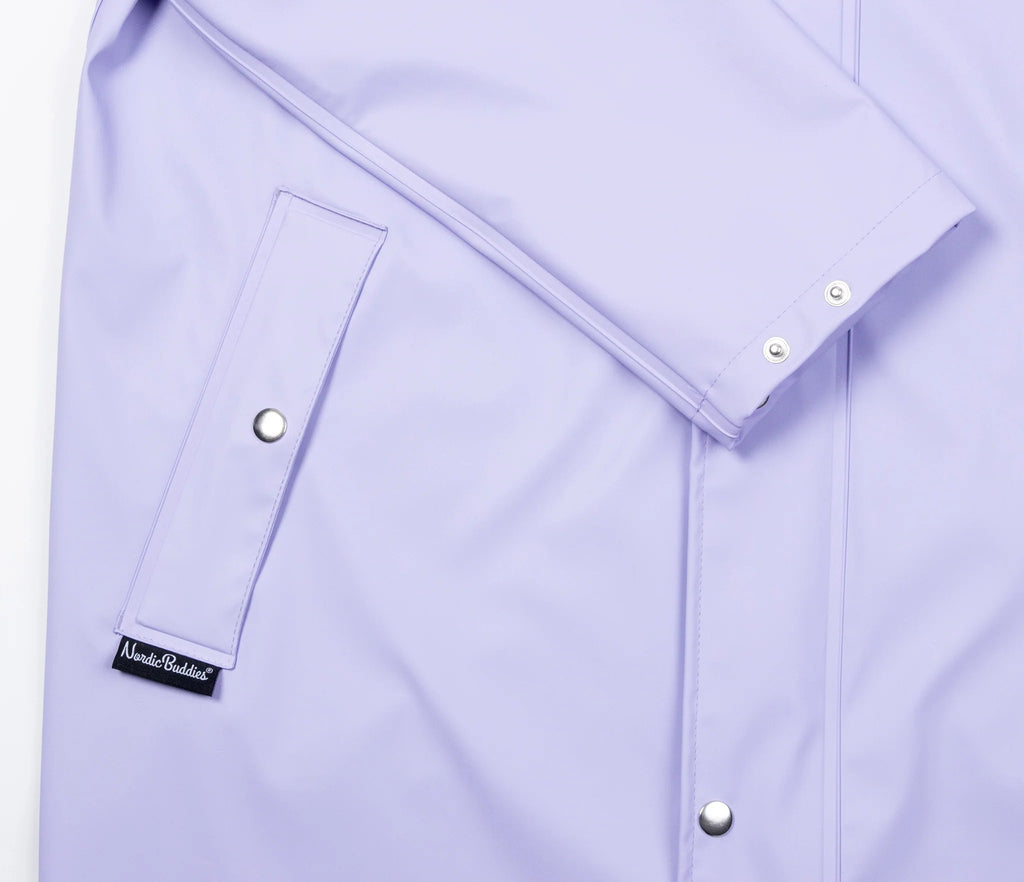 12. Close-up of sleeve and pocket details on Moomin Adventure Rain Jacket in lilac