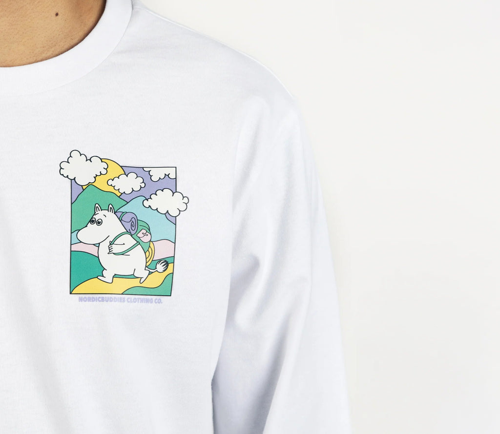 4. Close-up of Moomintroll's Adventure graphic on white longsleeve shirt, emphasizing colorful design and cotton fabric