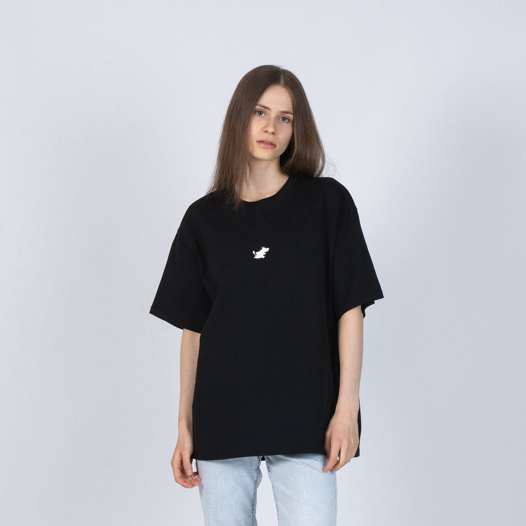 7. Female model wearing black Moomin Classics heavy t-shirt in studio setting