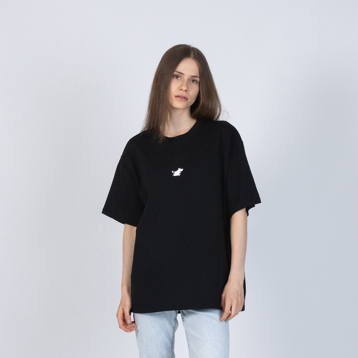 7. Female model wearing black Moomin Classics heavy t-shirt in studio setting