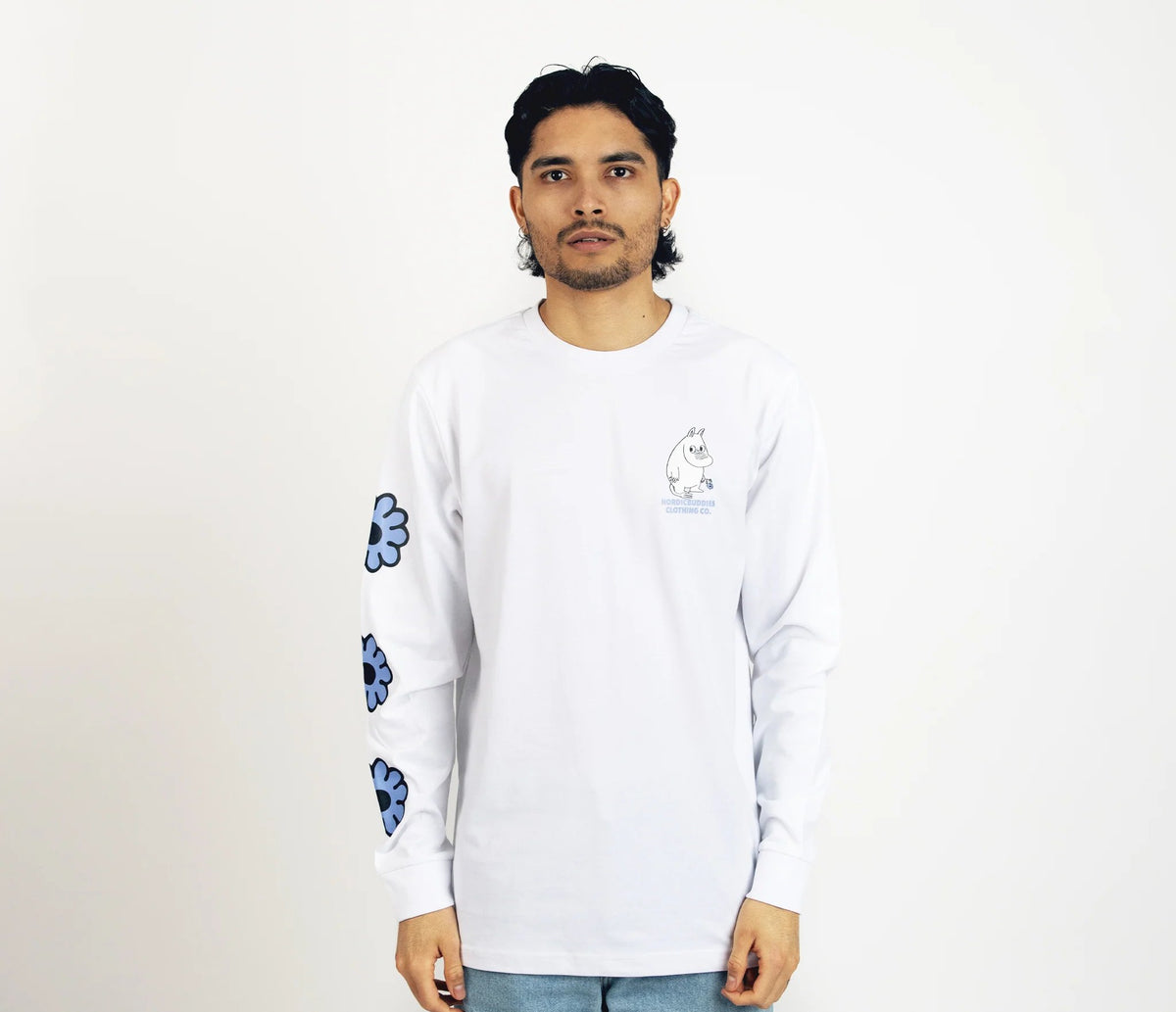6. Unisex white Moomintroll's Flower longsleeve shirt worn by male model, front view with blue floral sleeve design and cuffrib