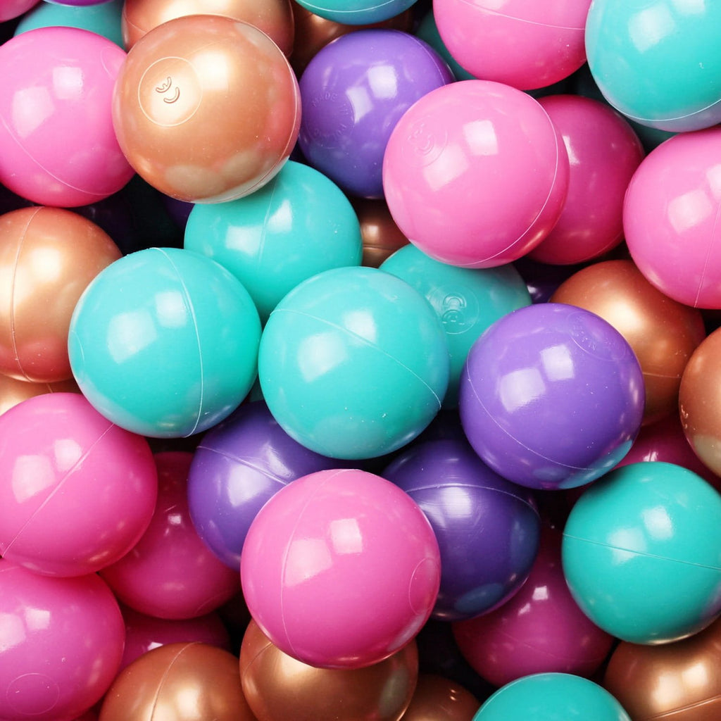 5. Close-up of colorful balls in gold, pink, lilac, and turquoise hues