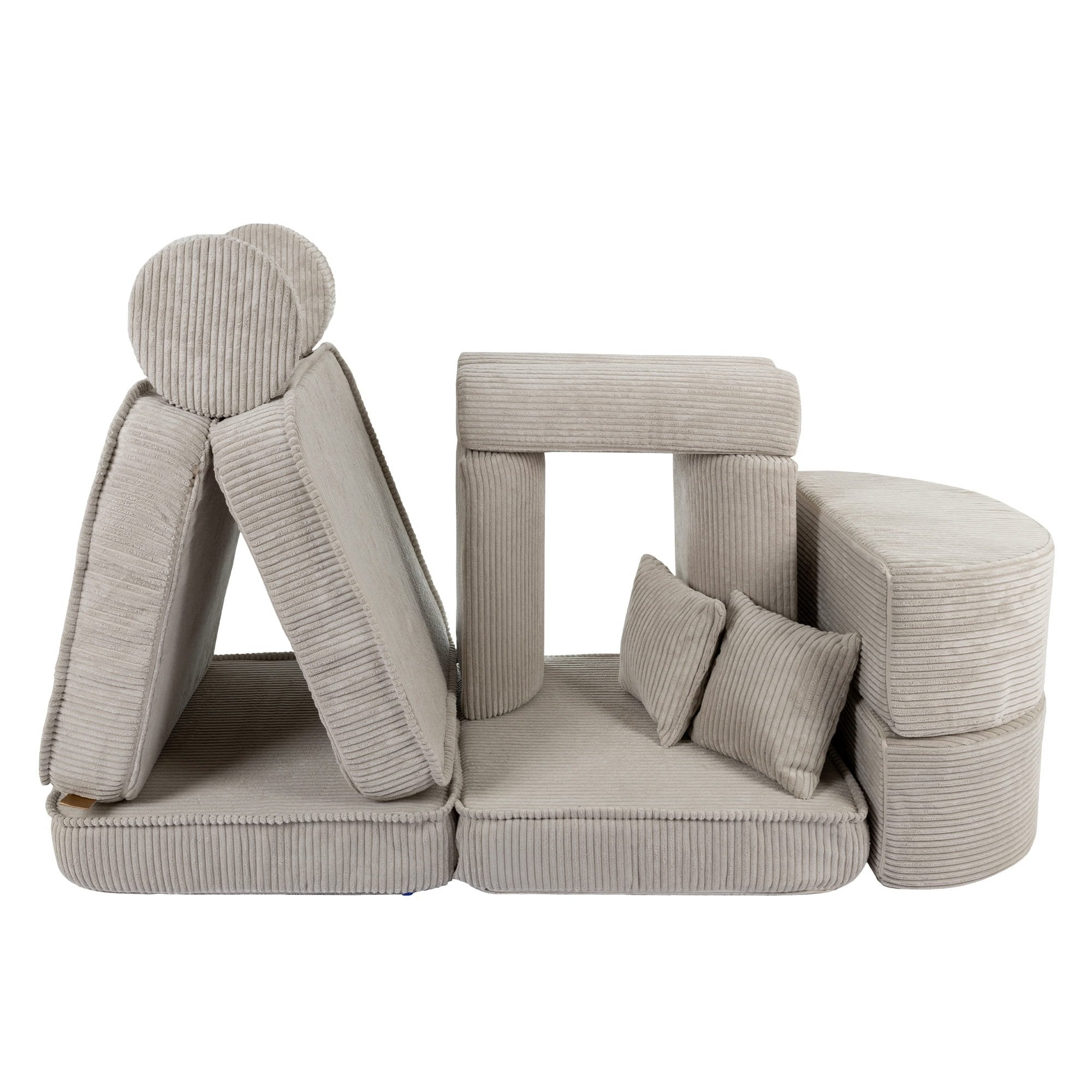 4. Ecru modular sofa for kids with ribbed texture, creatively arranged to form a play structure, shown in a studio setting.