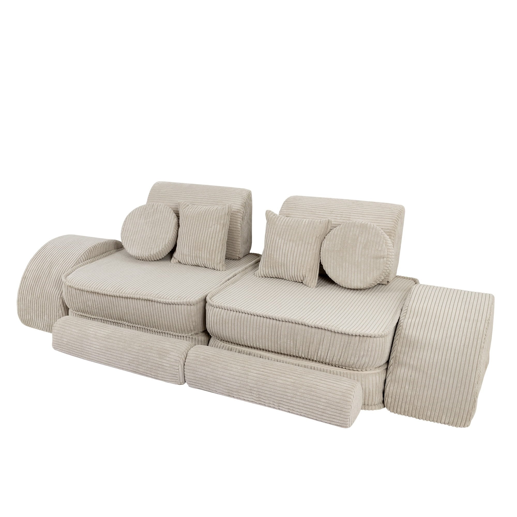 6. Ecru modular sofa for kids with ribbed texture, arranged in a versatile layout with cushions, shown in a studio setting.