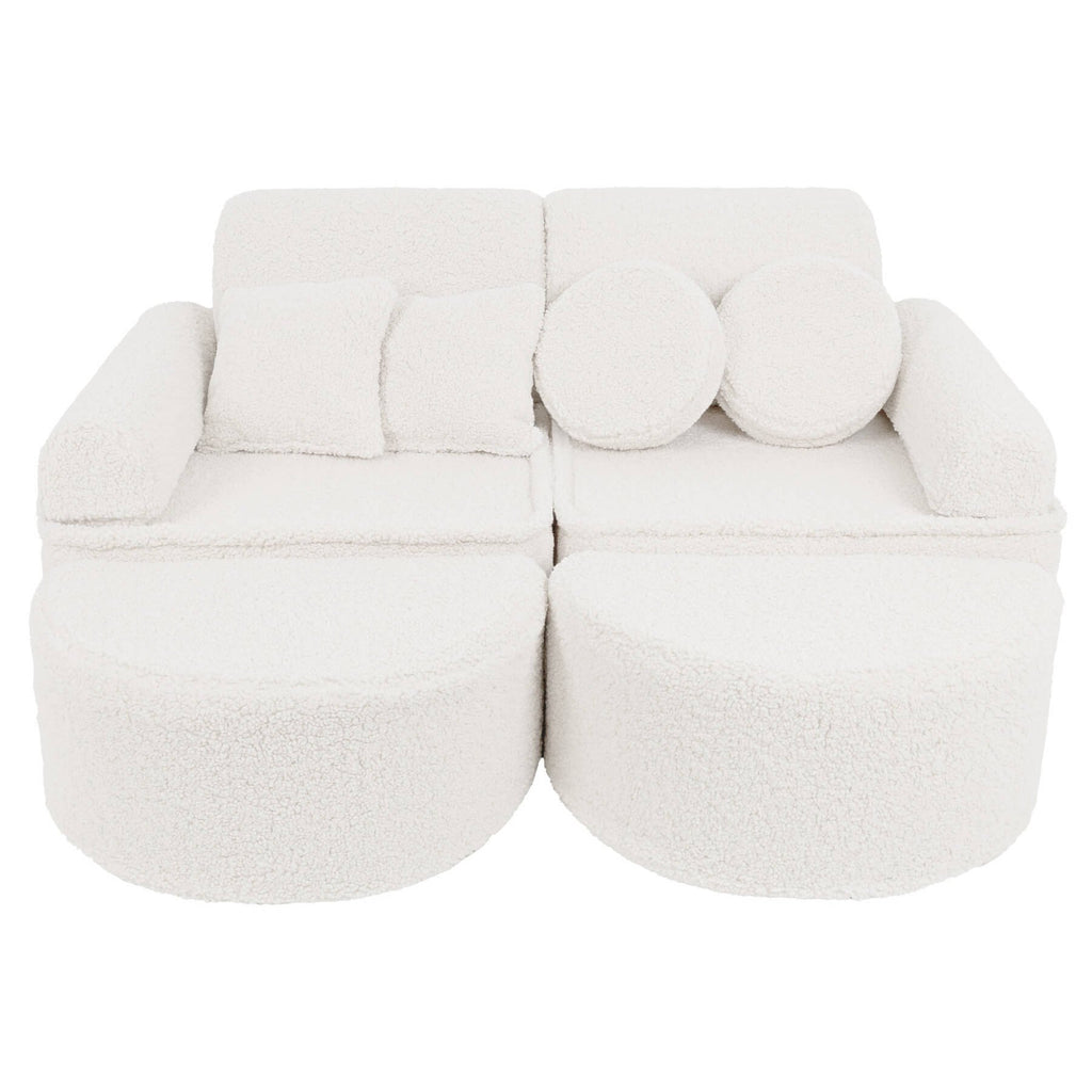 1. Modular children's sofa in bearly cream color with round and square cushions, shown in a complete setup