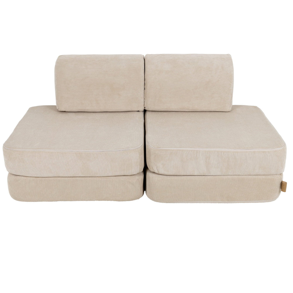 1. Small modular children's sofa in ecru Slimcord fabric with two back cushions and two seat cushions, shown in a studio setting