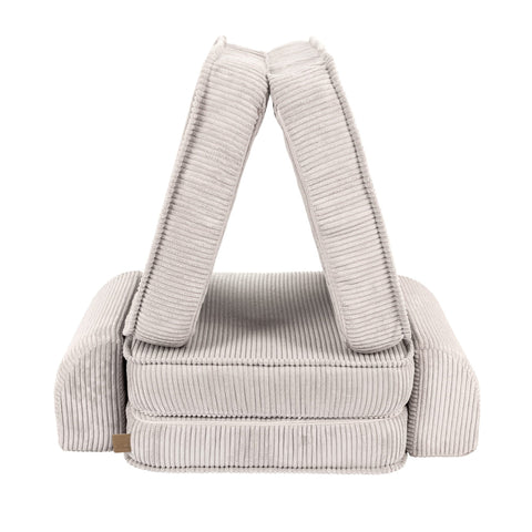 4. Ecru ribbed modular children's sofa arranged in a triangular formation, showcasing versatility, on a white background