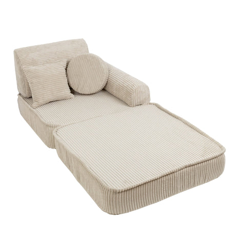 4. Single seat configuration of children's modular sofa in aesthetic ecru with ribbed texture, featuring one back cushion and one round pillow, in a studio setting