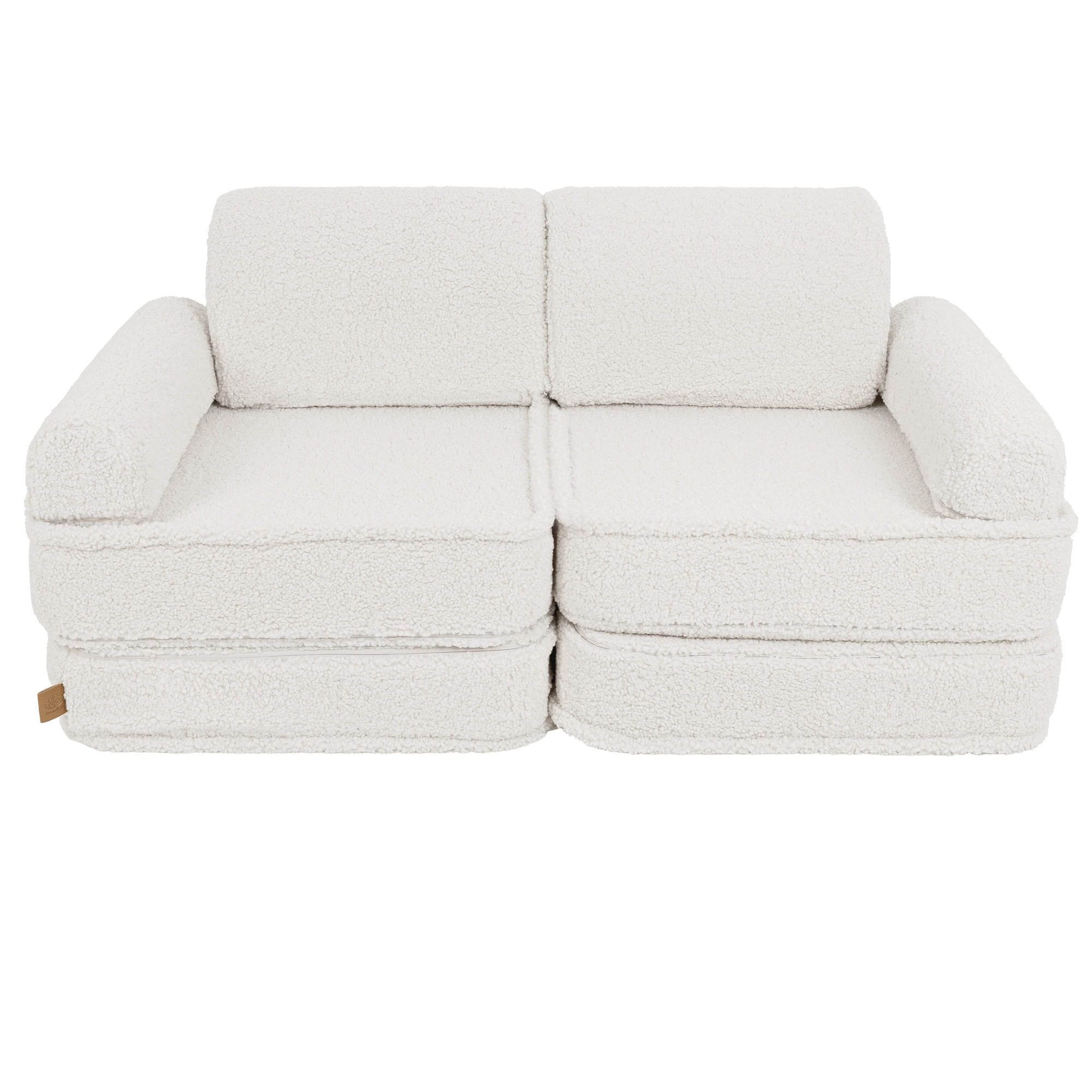 2. Medium modular sofa for kids in bearly cream without cushions, shown in a studio setting.