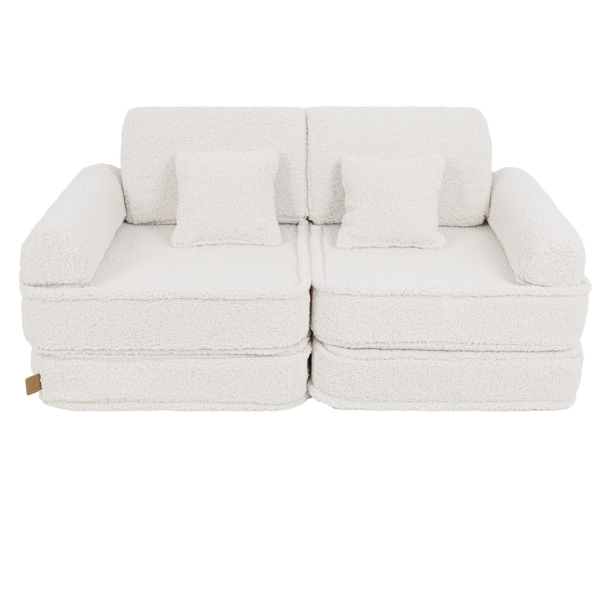 2. Medium modular sofa for kids in bearly cream with two square cushions, shown in a studio setting.
