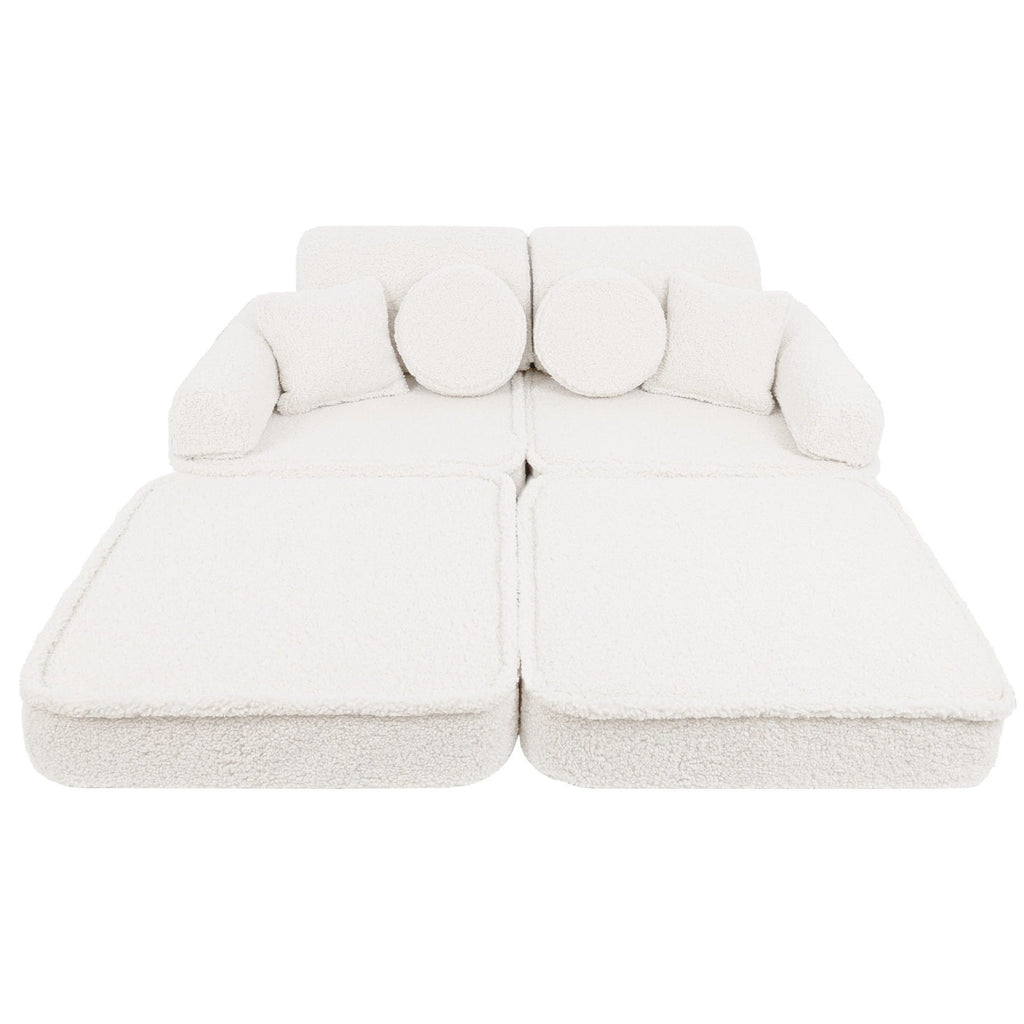 2. Medium modular sofa for kids in bearly cream with extended seating, shown in a studio setting.