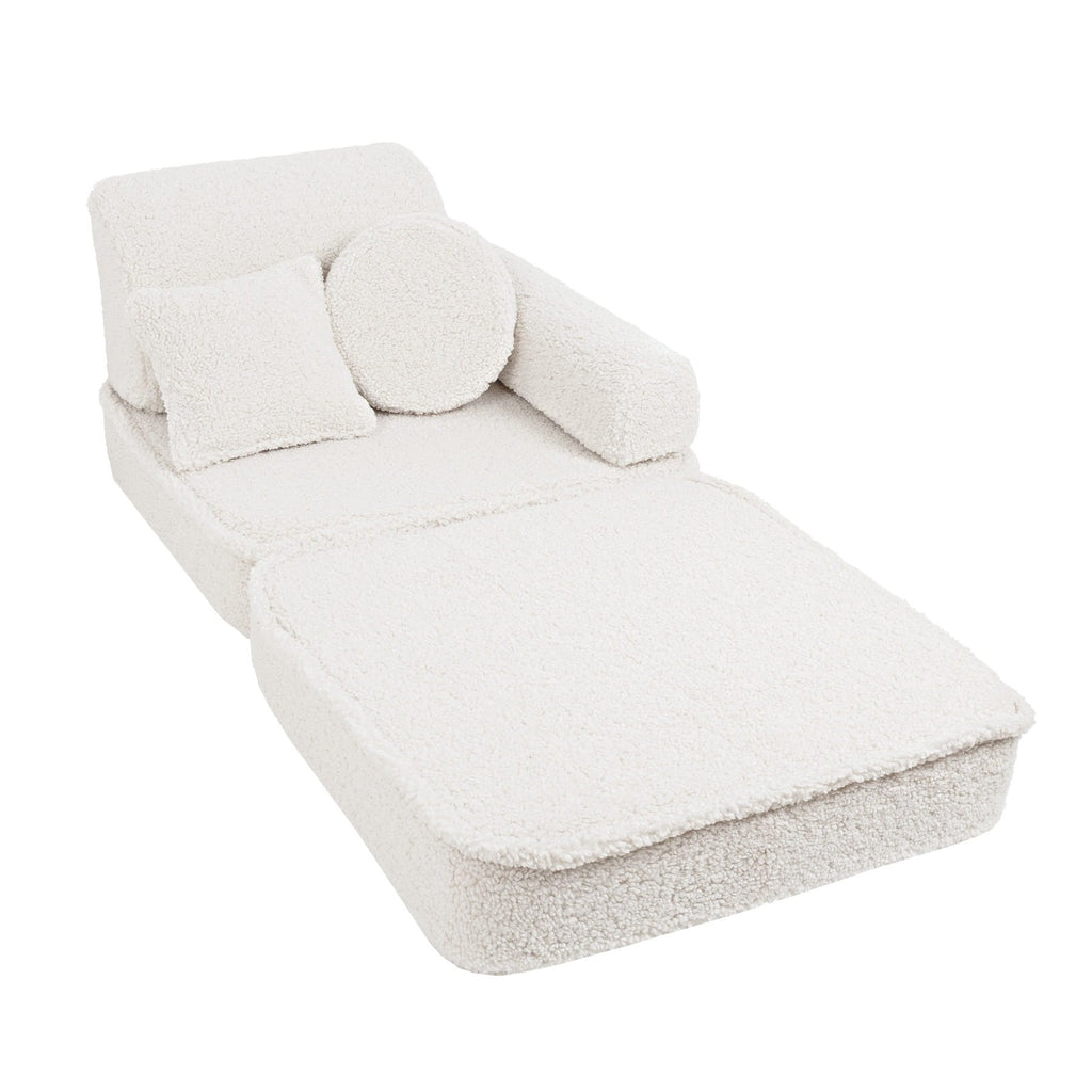 3. Close-up of medium modular sofa for kids in bearly cream with one square and one round cushion, shown in a studio setting.