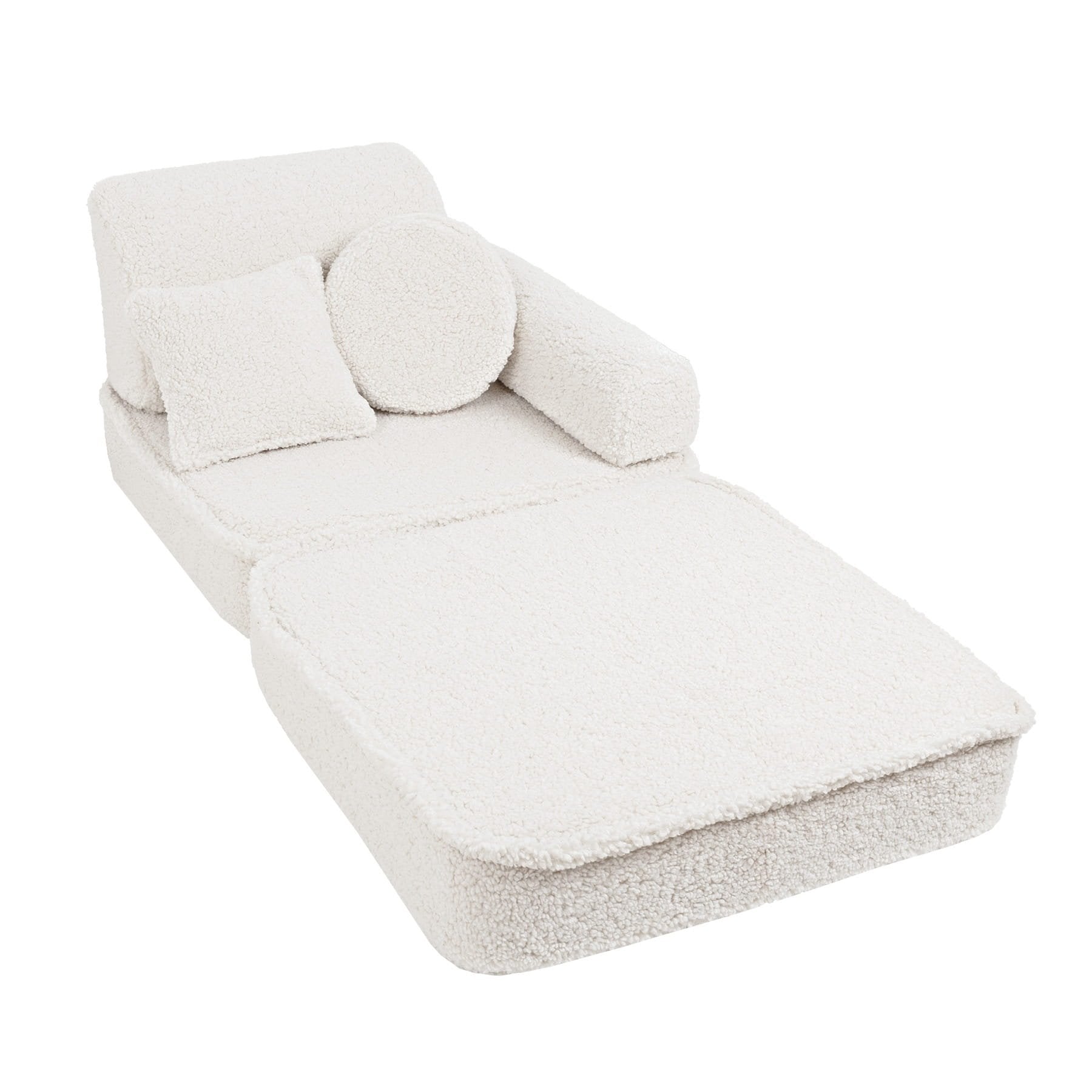 3. Close-up of medium modular sofa for kids in bearly cream with one square and one round cushion, shown in a studio setting.