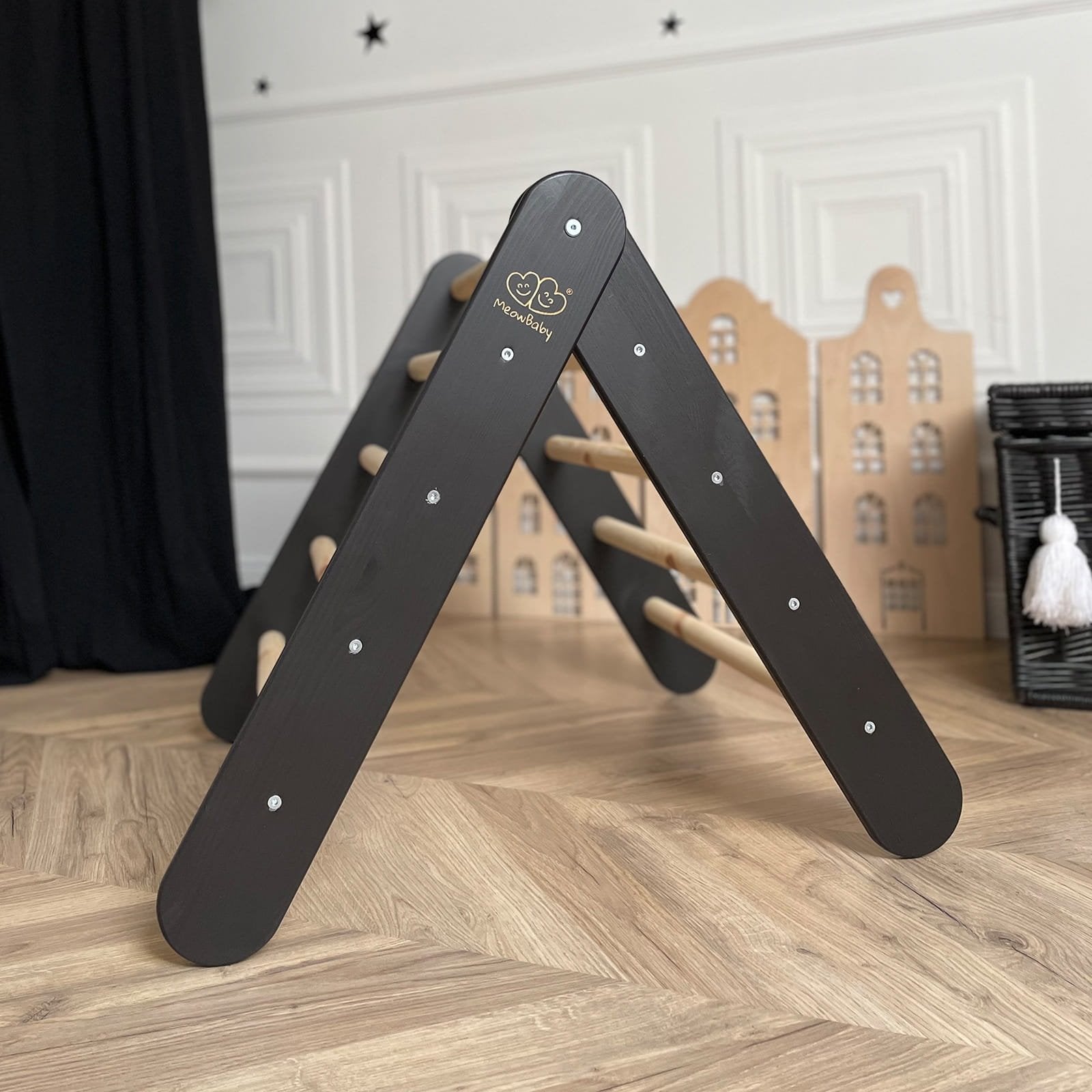 5. Black wooden ladder structure for children's playhouse in playroom with decorative background