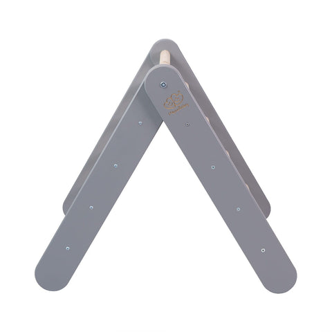5. Side view of grey ladder house with natural wood rungs on white background