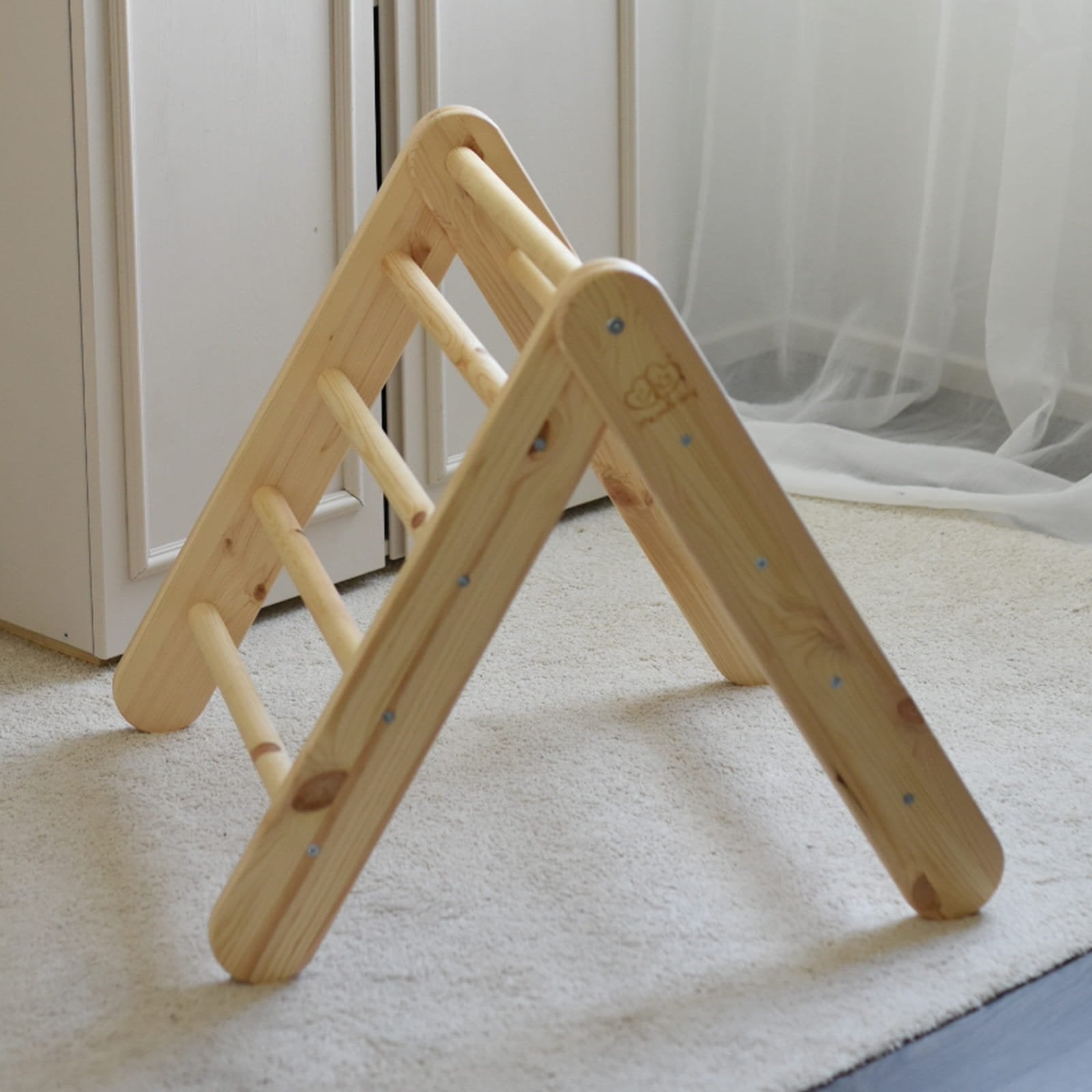 9. Natural wood ladder house in children's room setting on carpet