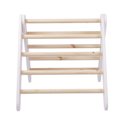 4. Front view of white ladder house with natural wood rungs