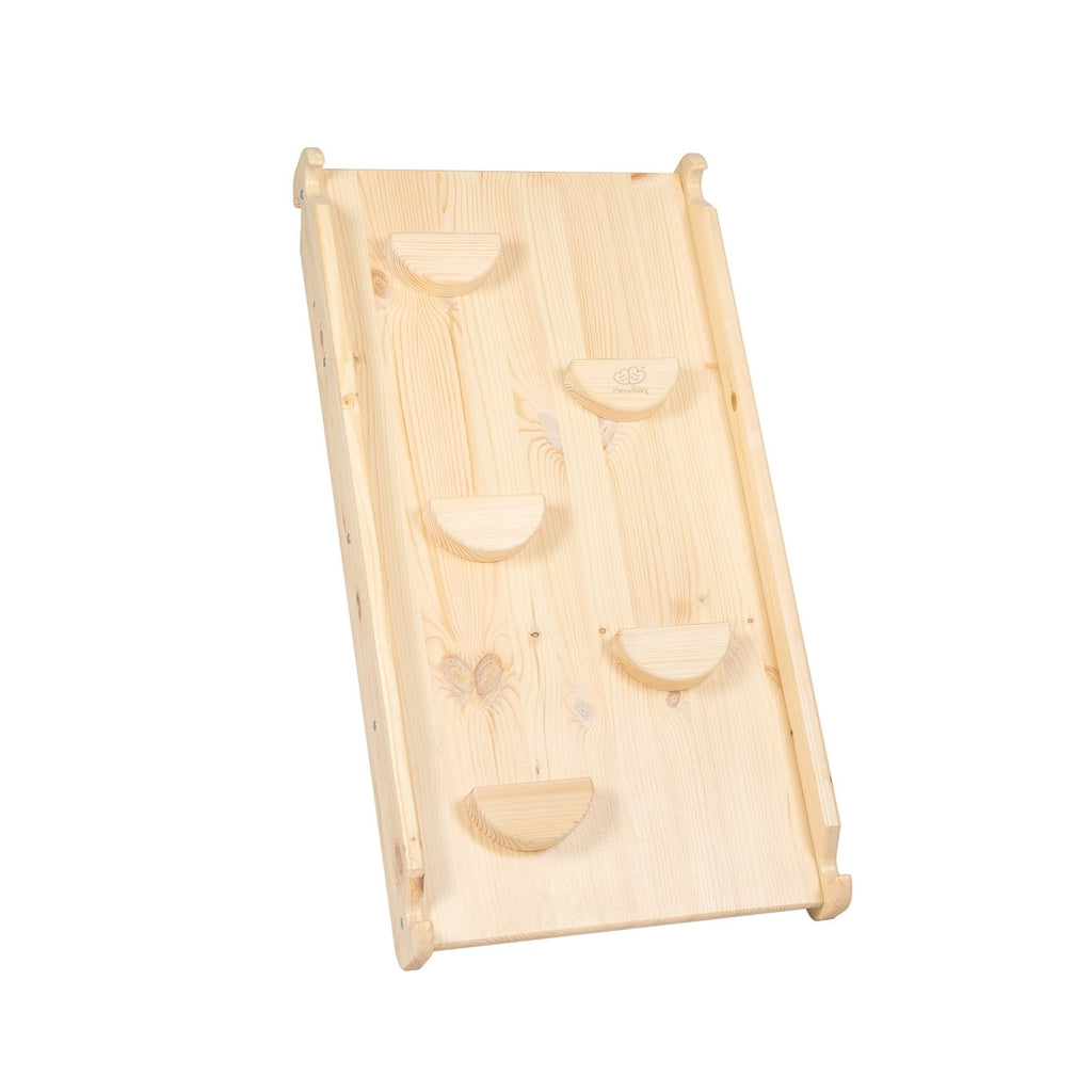 5. Flat lay of natural wood climbing wall with rounded grips for children's play