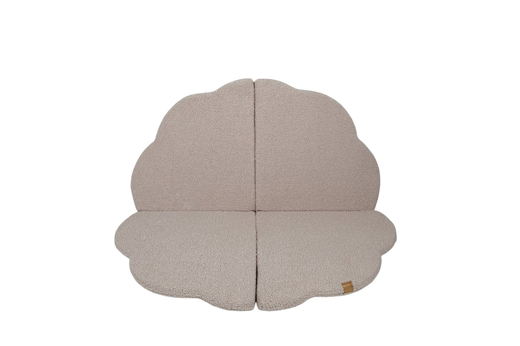 1. Cloud-shaped play mat in light grey with textured surface, shown flat against a black background