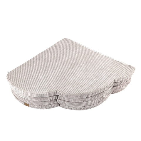 3. Folded cloud-shaped ecru play mat for kids with ribbed texture, shown in studio setting