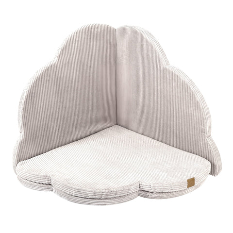 2. Cloud-shaped ecru play mat for kids with ribbed texture, shown upright in studio setting
