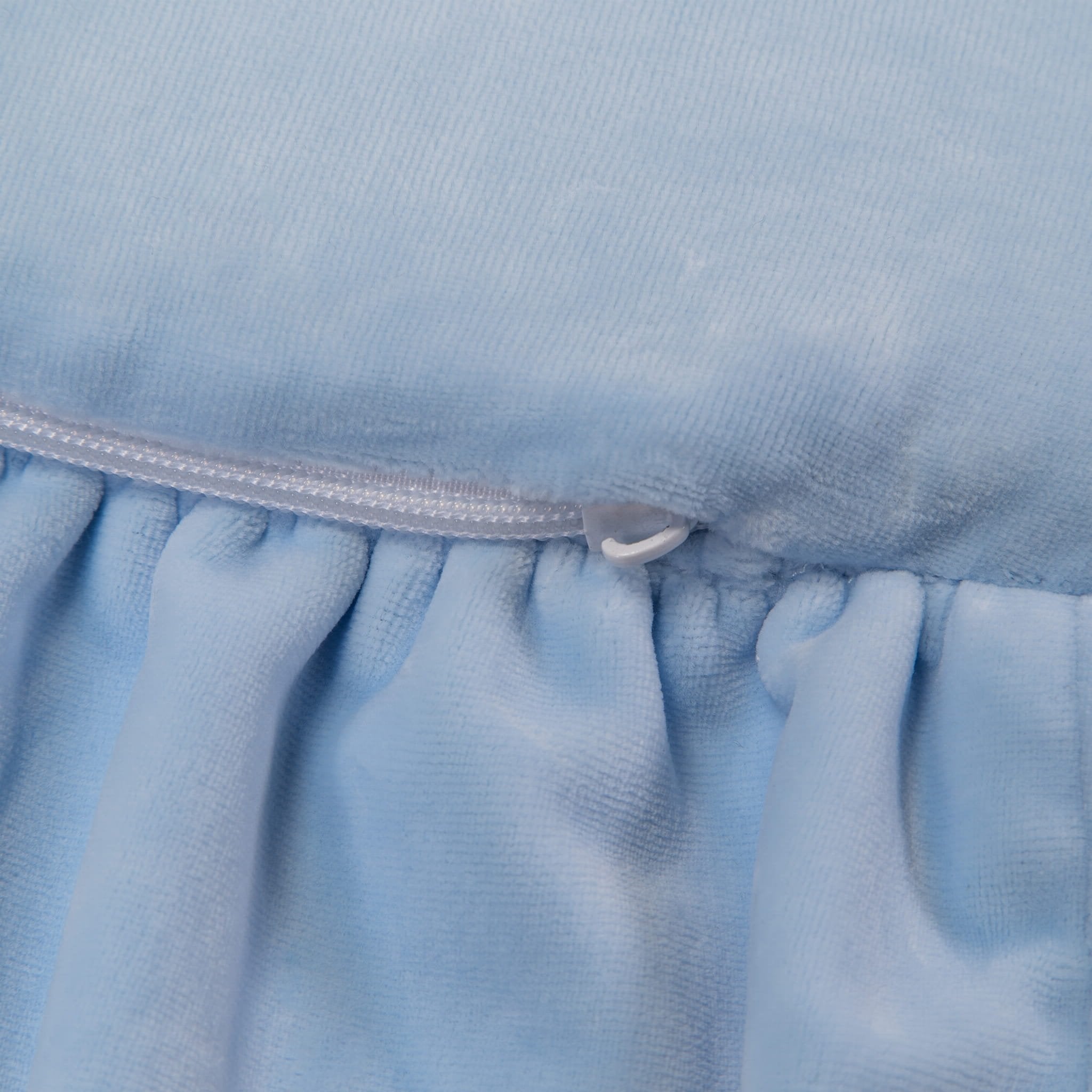 2. Close-up of baby blue velvet fabric with frill and zipper detail on MeowBaby play mat