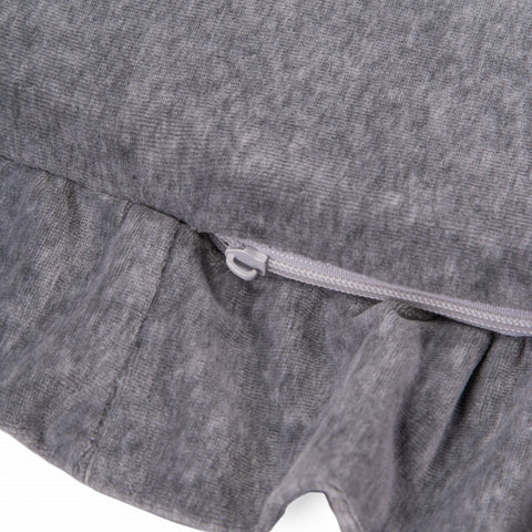 3. Close-up of grey velvet play mat showing zipper and frill detail