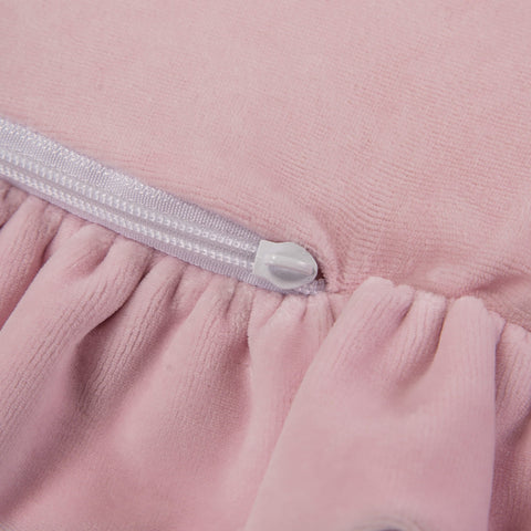3. Close-up of pink velvet play mat with frill and zipper detail