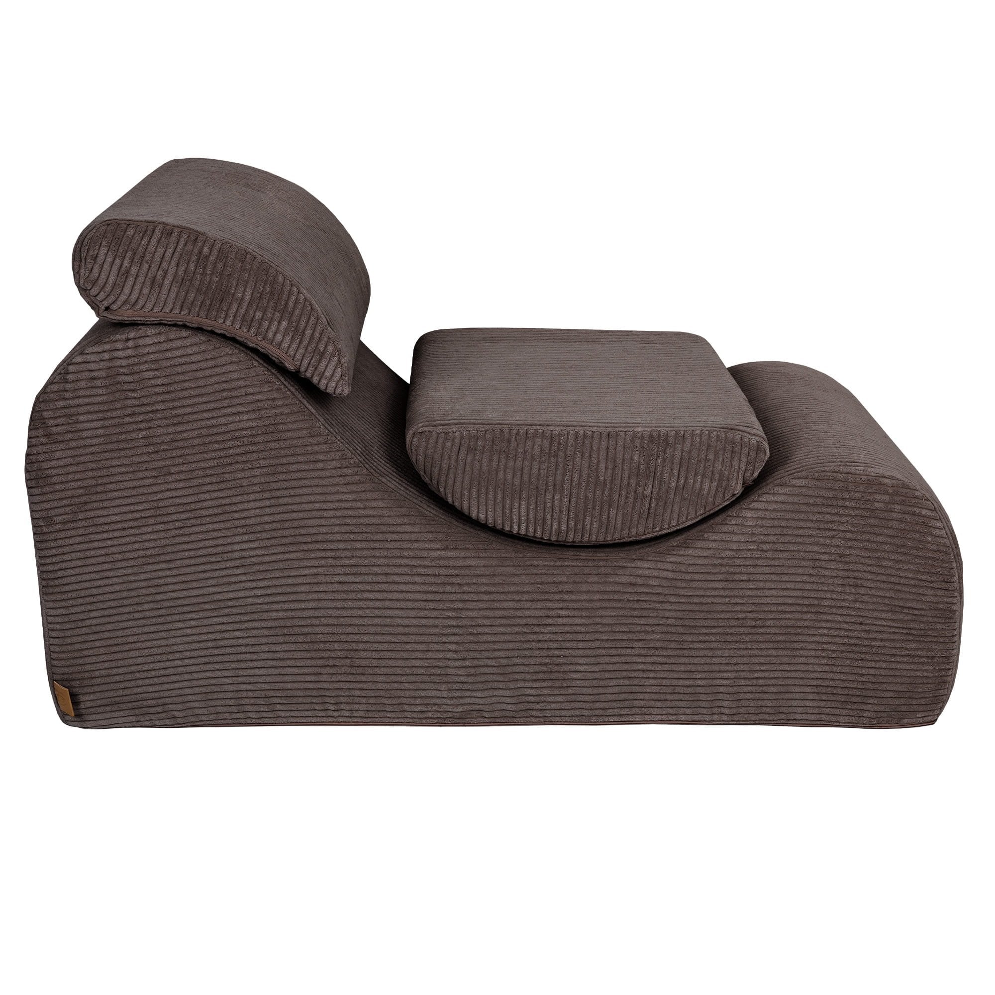2. Side view of brown wave lounger with ribbed texture and adjustable headrest