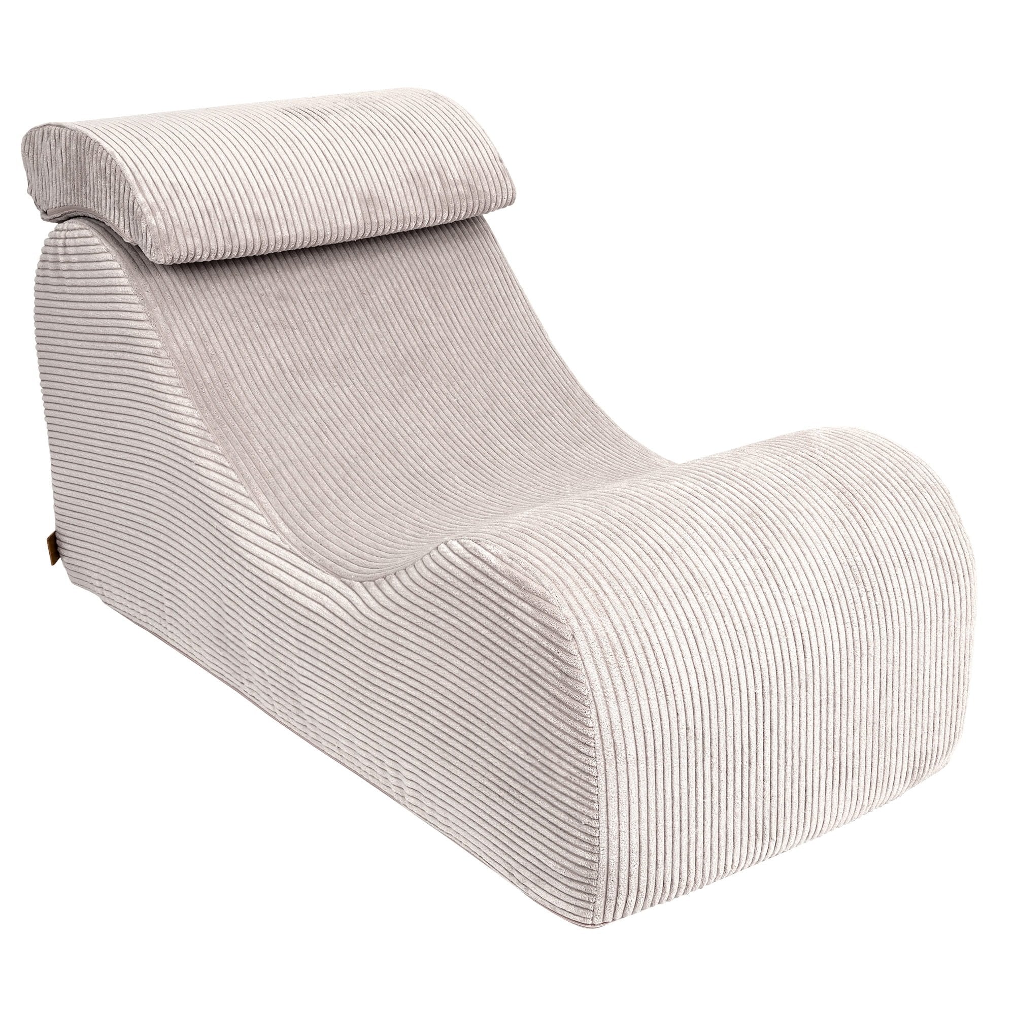 8. Ecru wave lounger with ergonomic headrest in ribbed fabric, shown in a studio setting