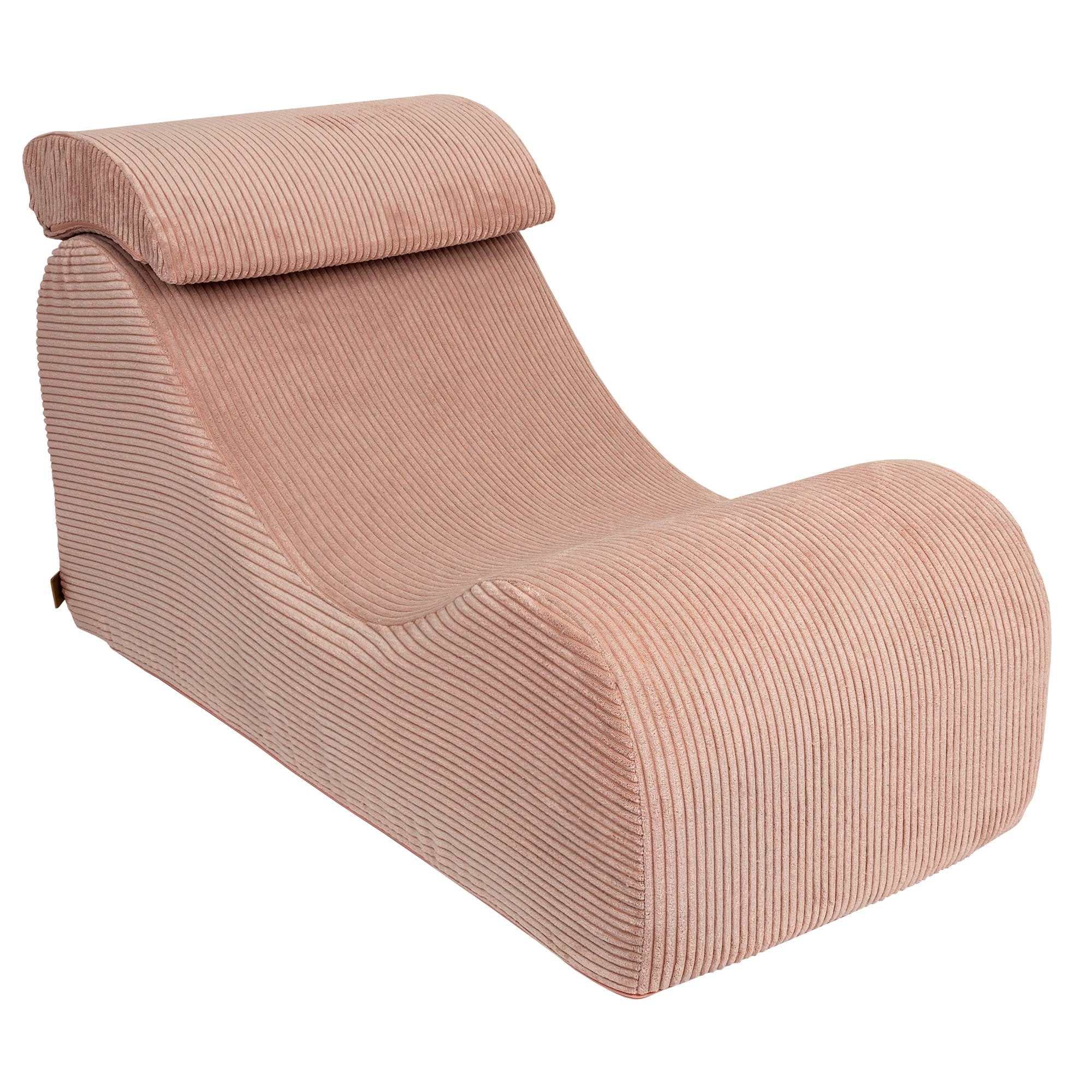 6. Powder rose wave lounger with ergonomic headrest in studio setting