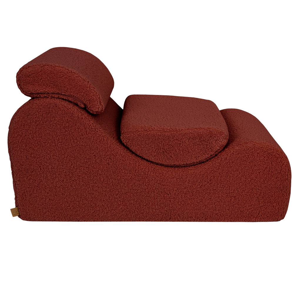 6. Side view of Brown Bearly Wave Lounger with headrest, highlighting plush texture