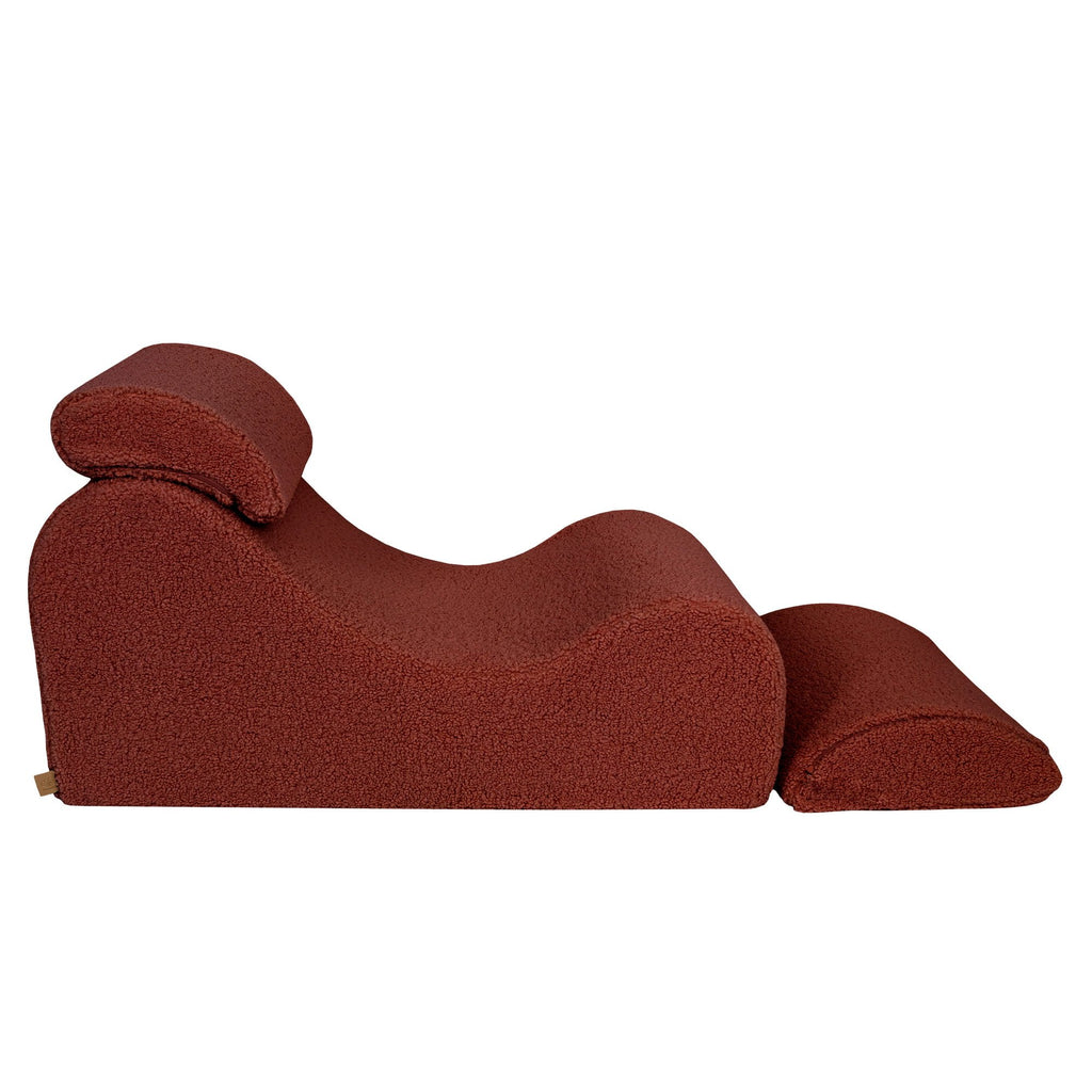5. Side view of Brown Bearly Wave Lounger with extended footrest, showing S-shaped contour