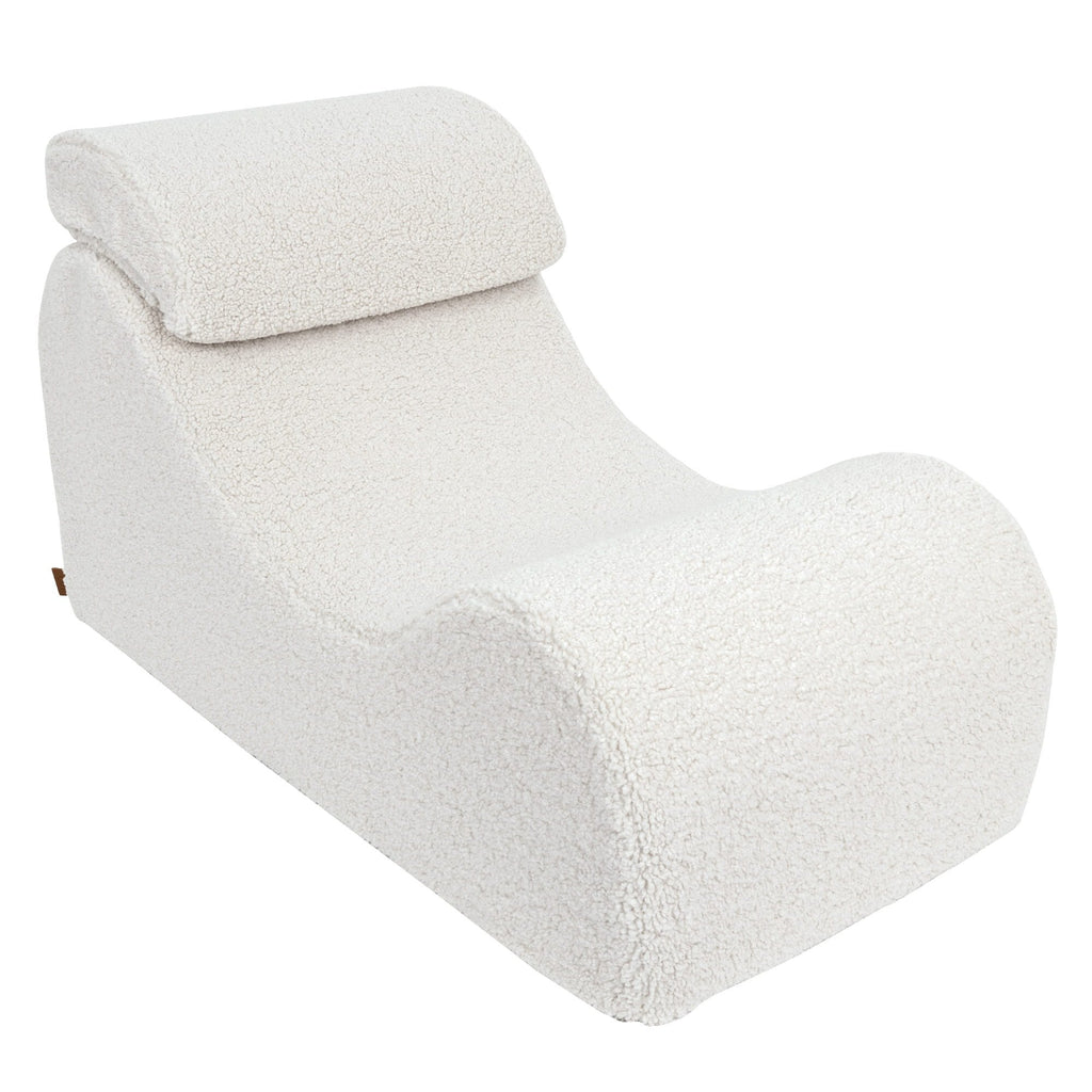 7. Cream Wave Lounger with headrest, featuring its contoured ergonomic design