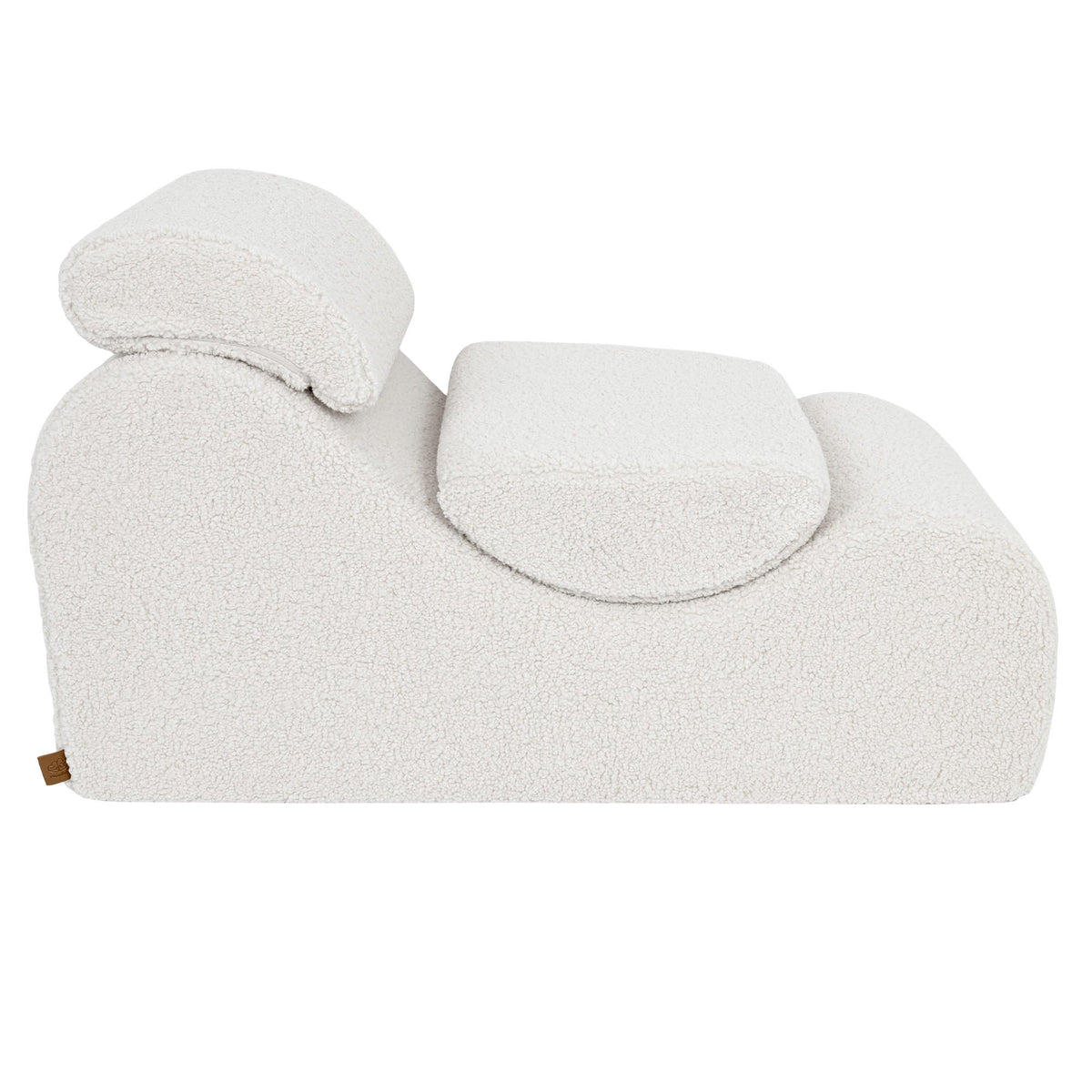 5. Side view of cream Wave Lounger with headrest and seat cushion, emphasizing its ergonomic shape