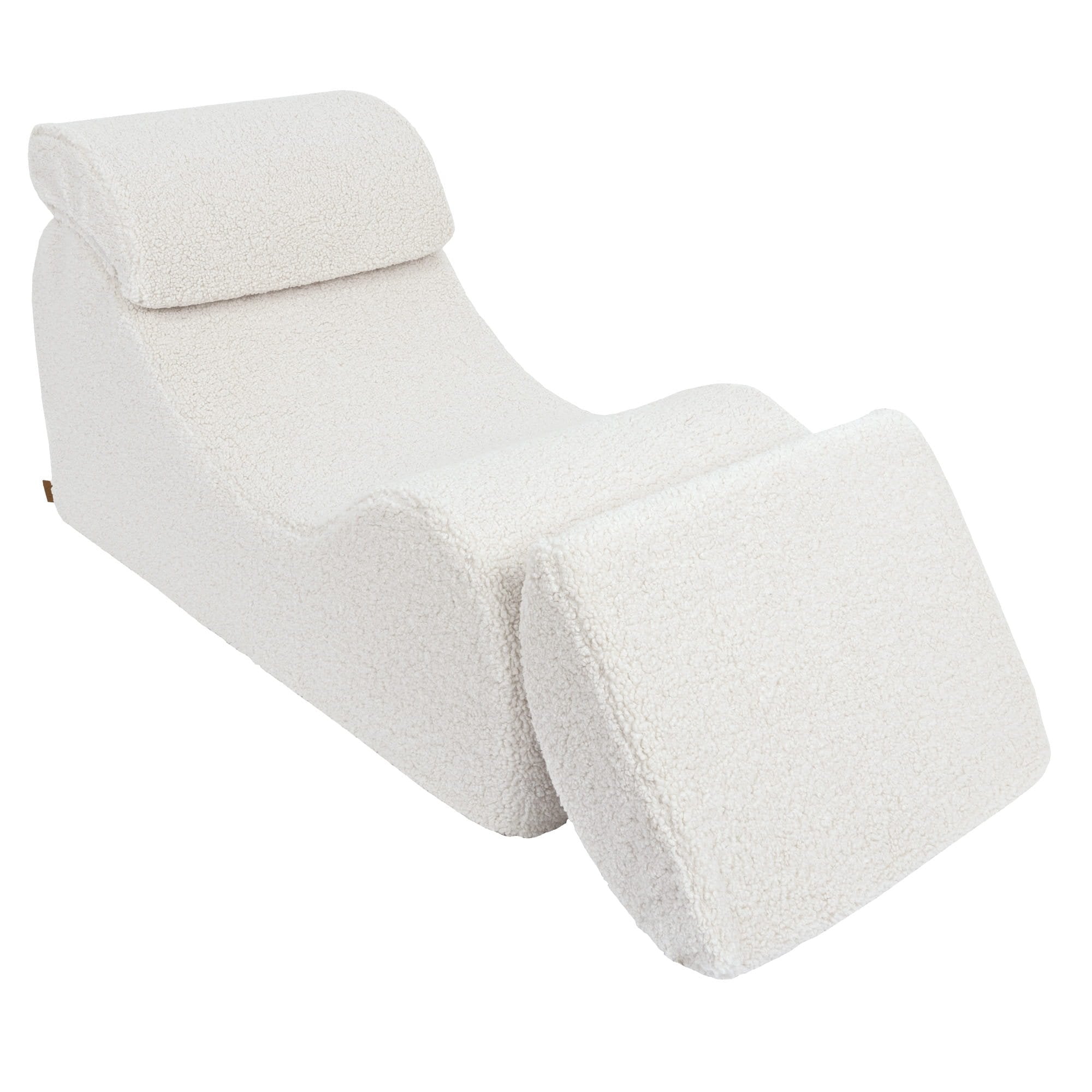 8. Cream Wave Lounger with extended footrest and headrest, shown in a studio setting
