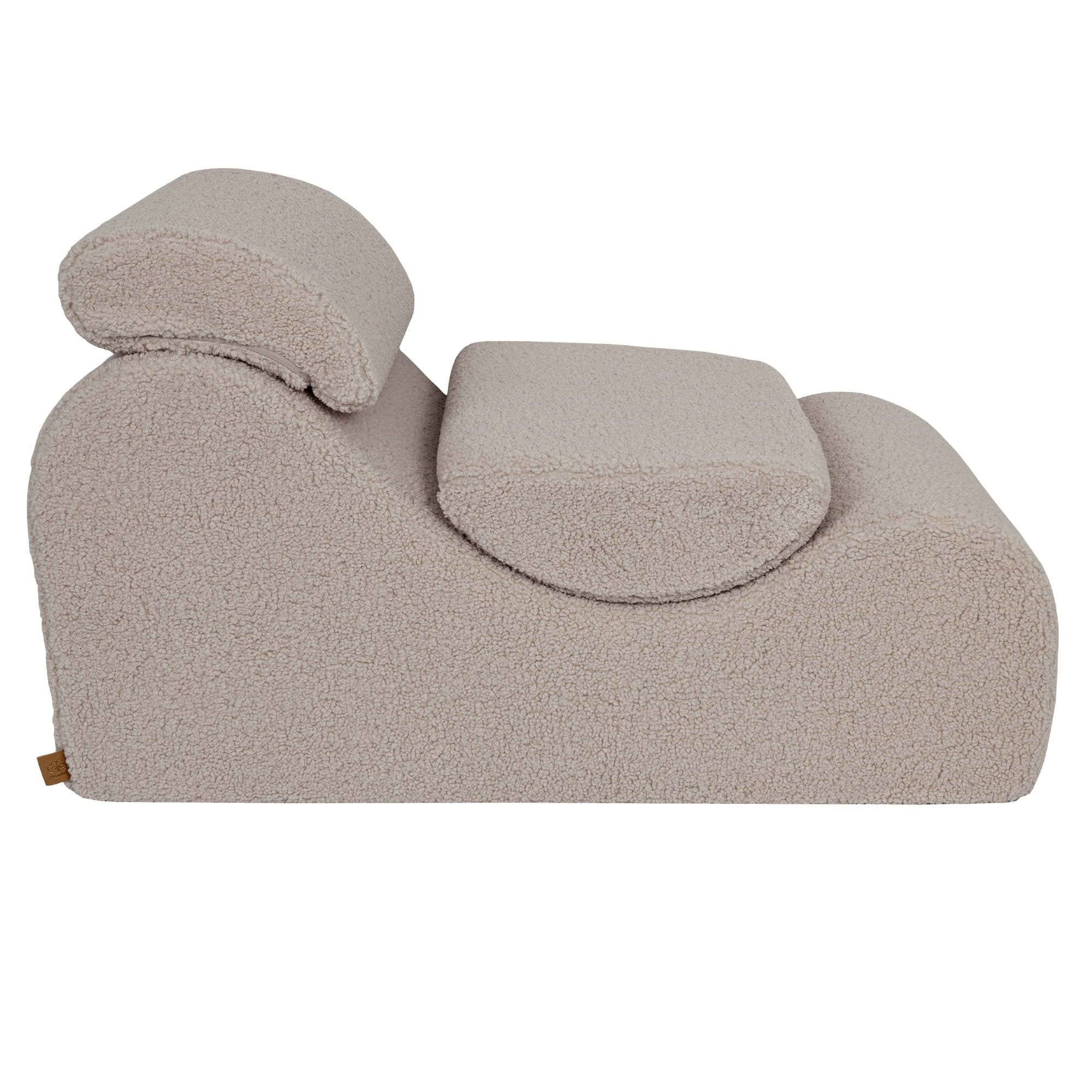 4. Side view of light grey Wave Lounger with ergonomic headrest and contoured seat