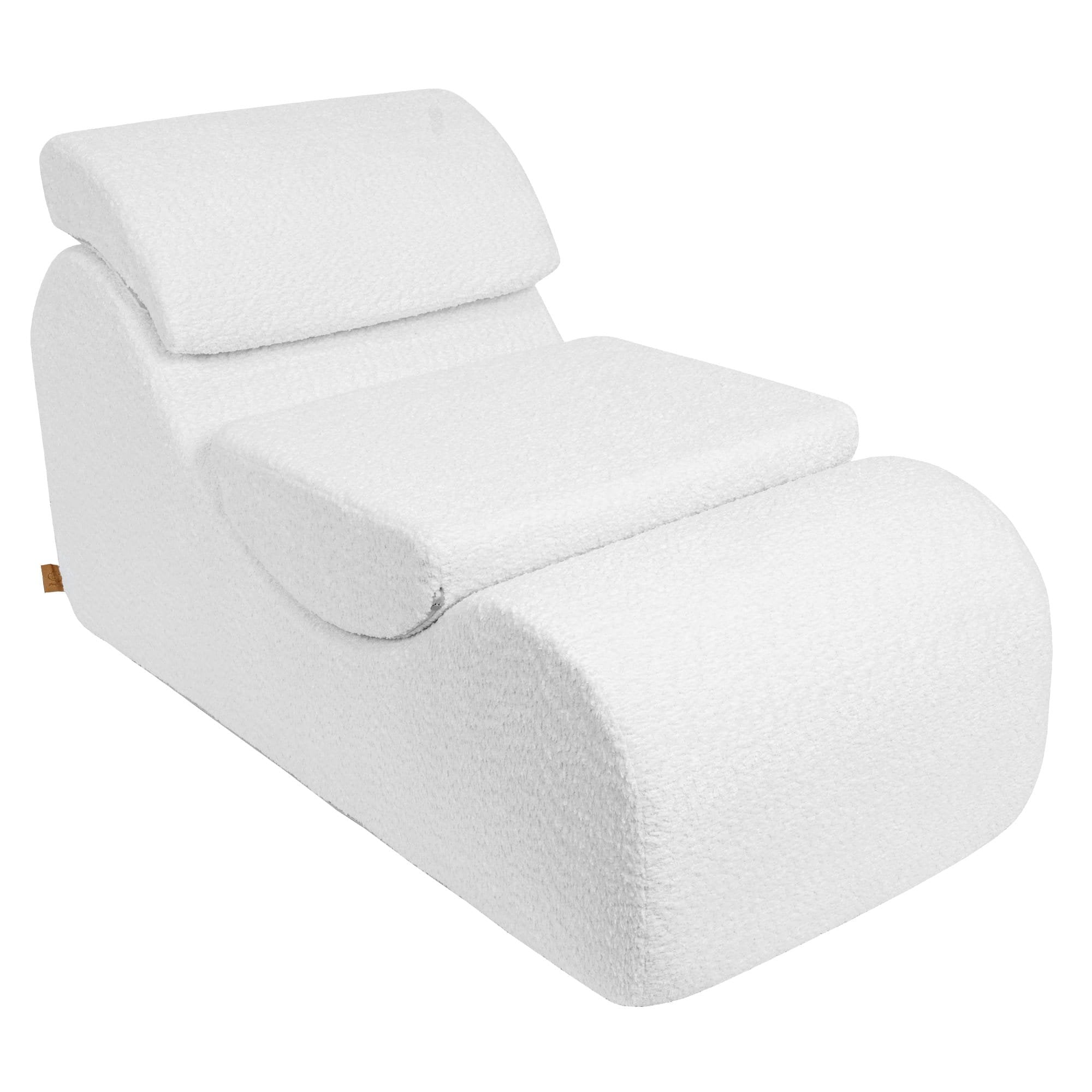 1. White boucle Wave Lounger with ergonomic design and removable headrest, shown in a side view highlighting its S-shaped contour