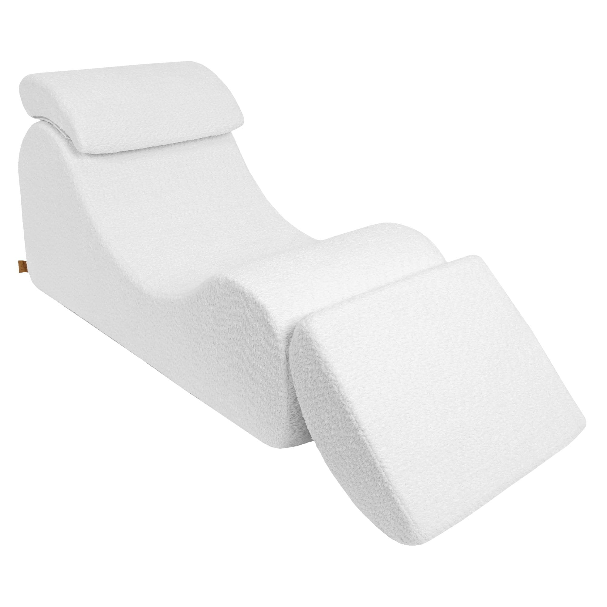 3. White boucle Wave Lounger with footrest in upright position, highlighting its versatile design and ergonomic features