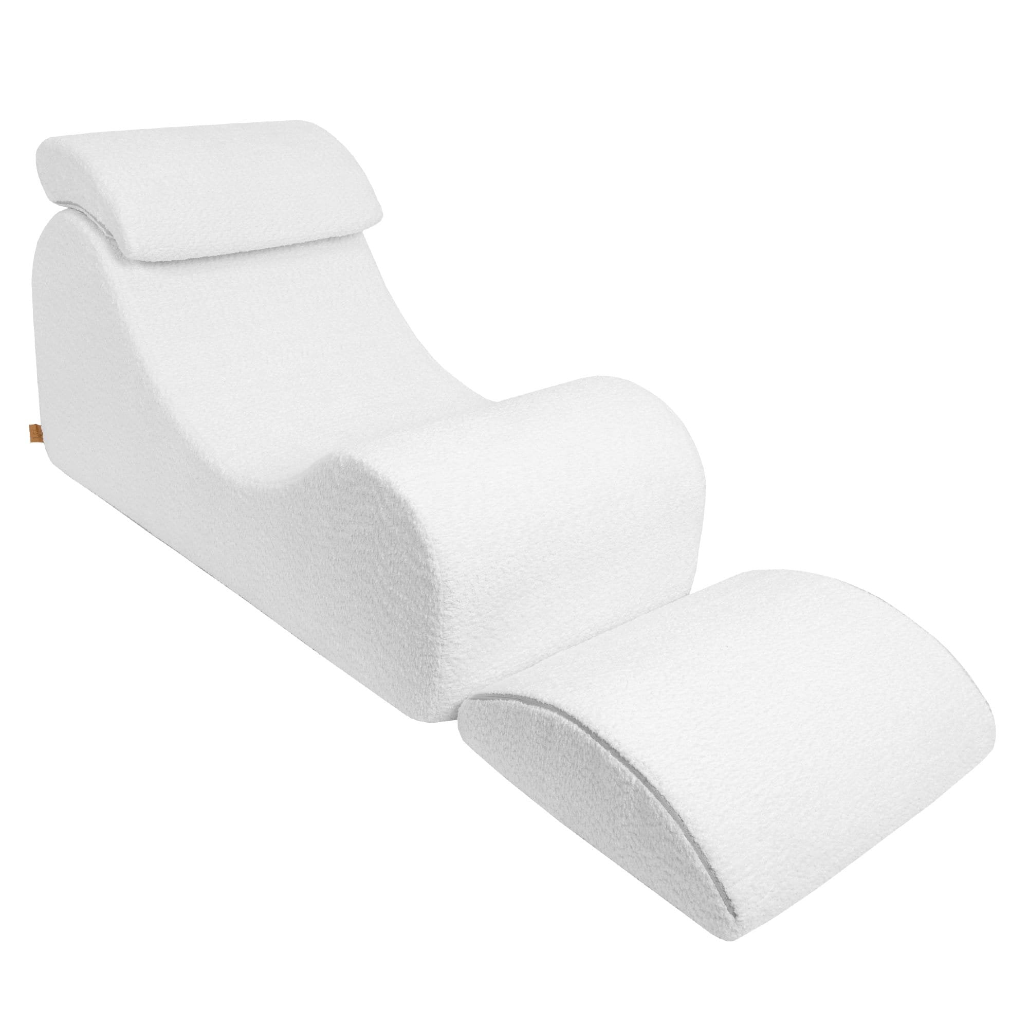 4. White boucle Wave Lounger with footrest partially extended, emphasizing its ergonomic S-shaped design