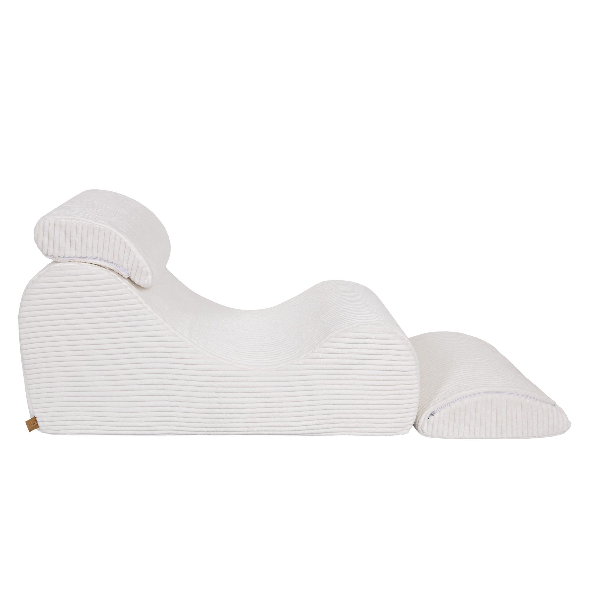 2. Side view of white furrycord Wave Lounger with distinctive S shape and removable headrest