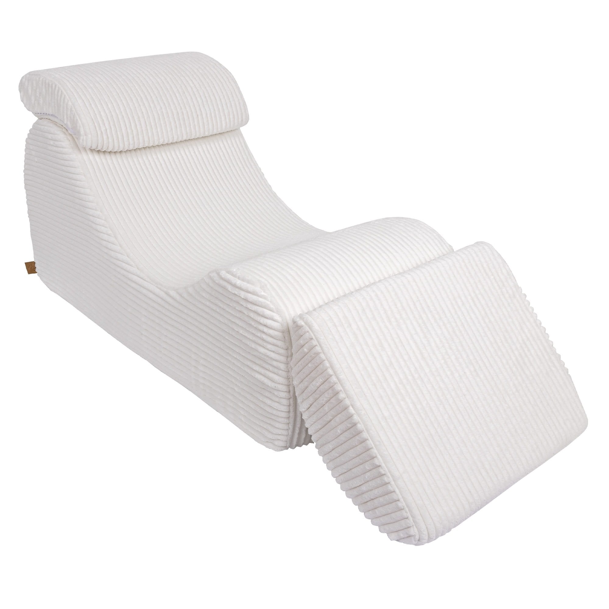 7. White furrycord Wave Lounger with raised footrest, showcasing ergonomic comfort